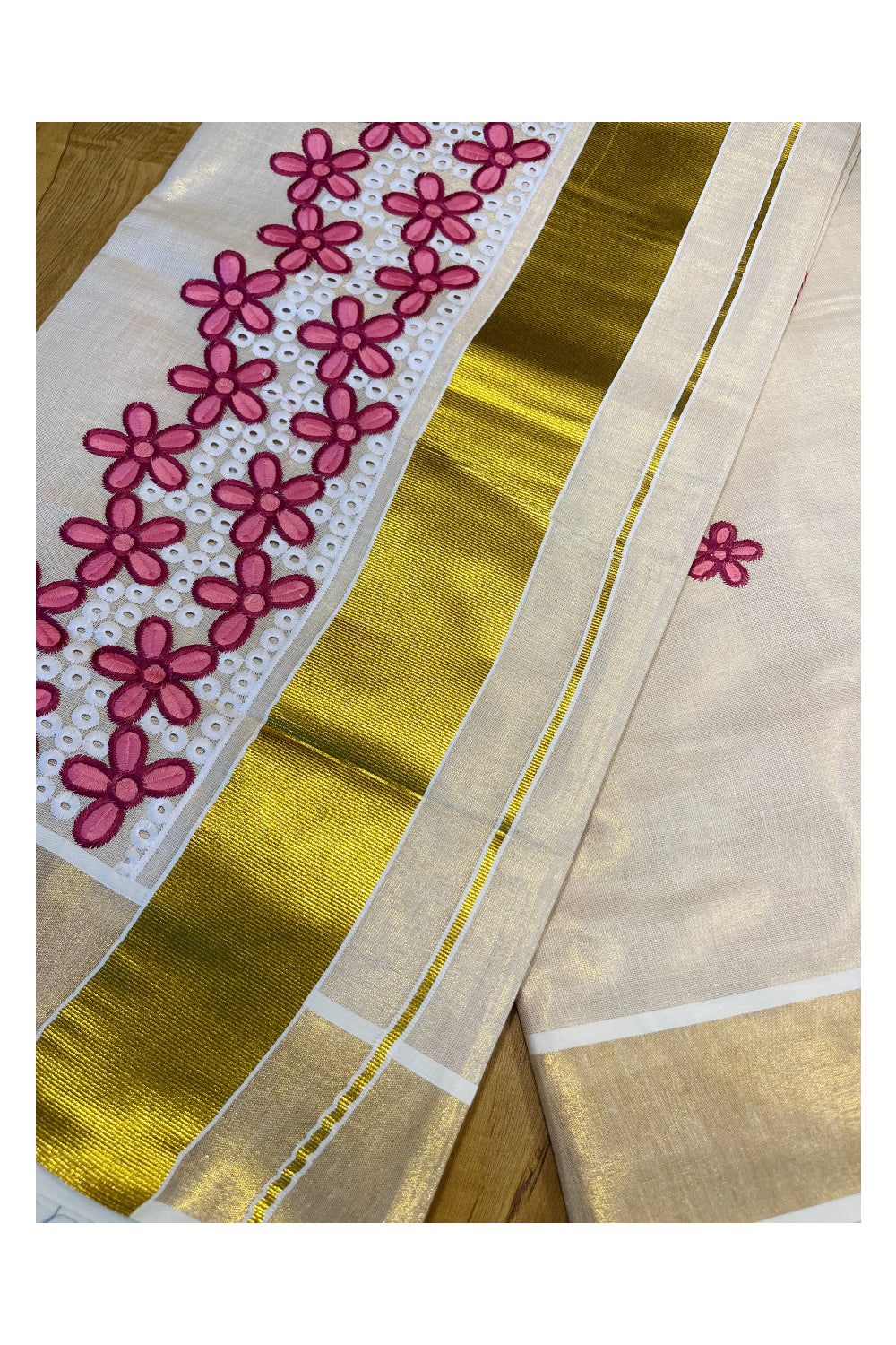 Kerala Tissue Kasavu Saree with Pink Floral Embroidery Works