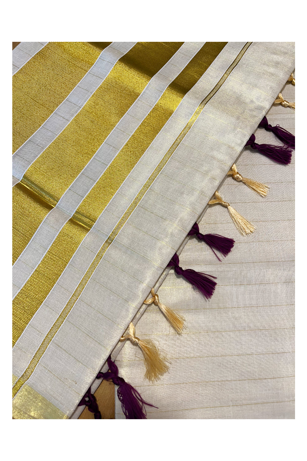 Kerala Tissue Lines Kasavu Saree with Violet Tassels Work