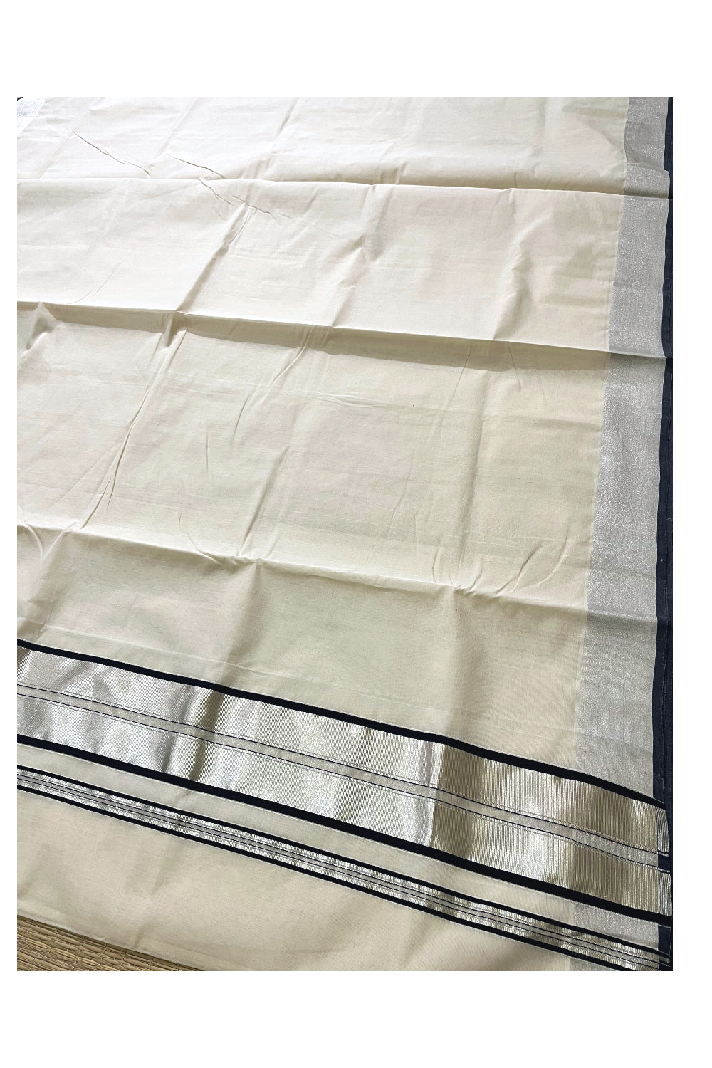 Southloom Super Premium Balaramapuram Unakkupaavu Handloom Saree with Silver Kasavu and Black Border