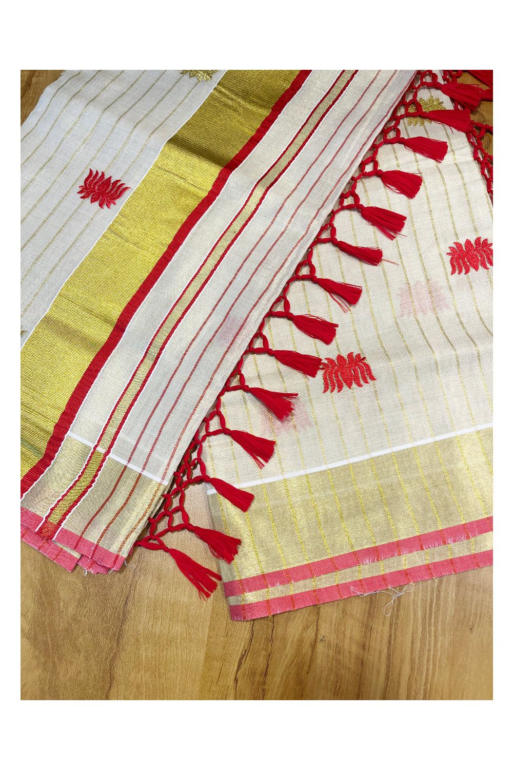 Kerala Tissue Kasavu Lines Saree with Red And Golden Lotus Embroidery Works