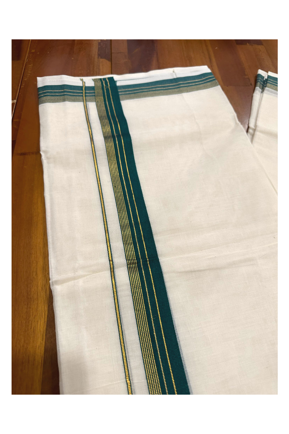 Southloom Premium Handloom Mundu with Green and Kasavu Kara (Onam Mundu 2023)