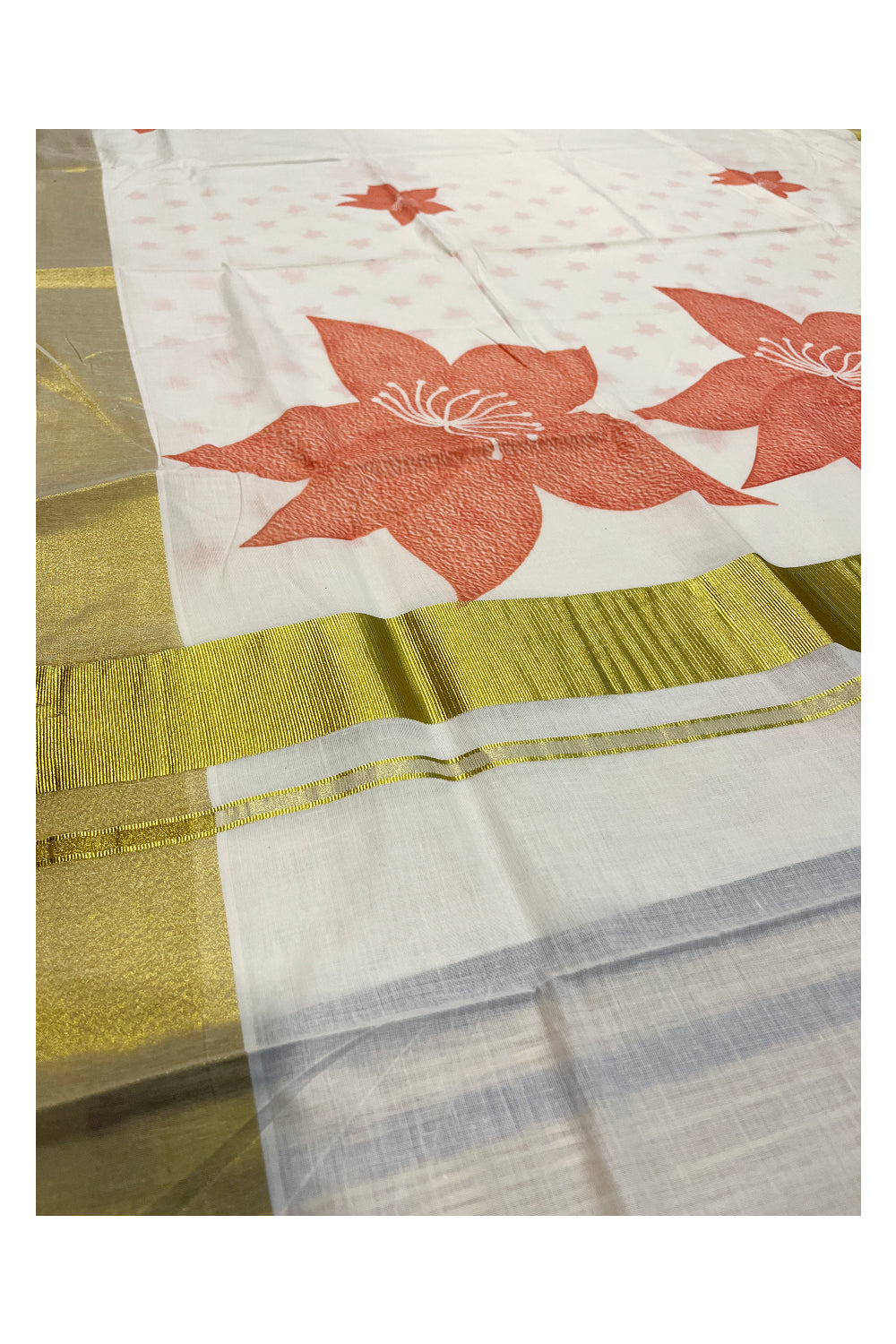 Southloom Exclusive Onam Kasavu Saree with Peach Floral Print Across Body in High Quality (Matching Printed Blouse Included)