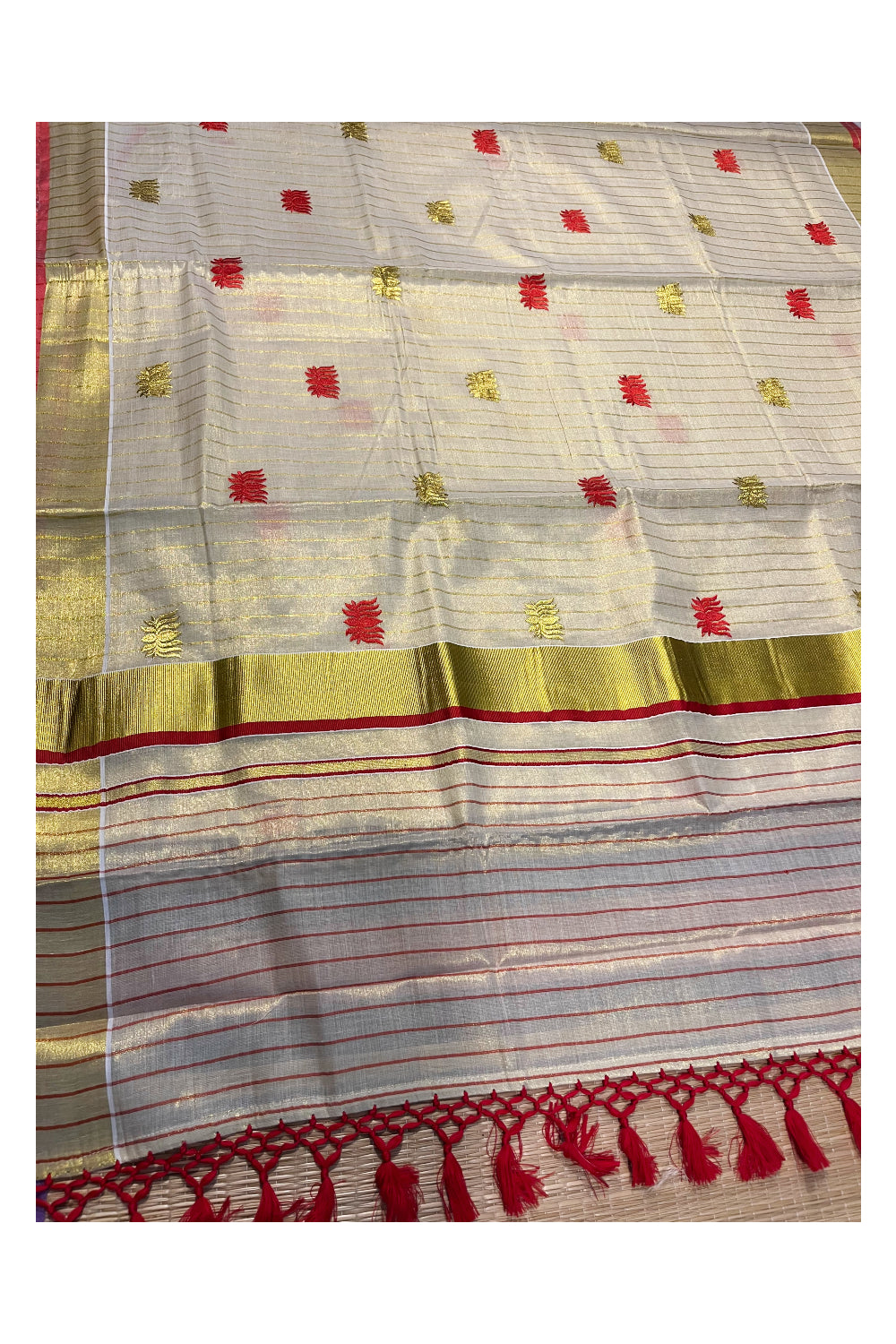 Kerala Tissue Kasavu Lines Saree with Red And Golden Lotus Embroidery Works