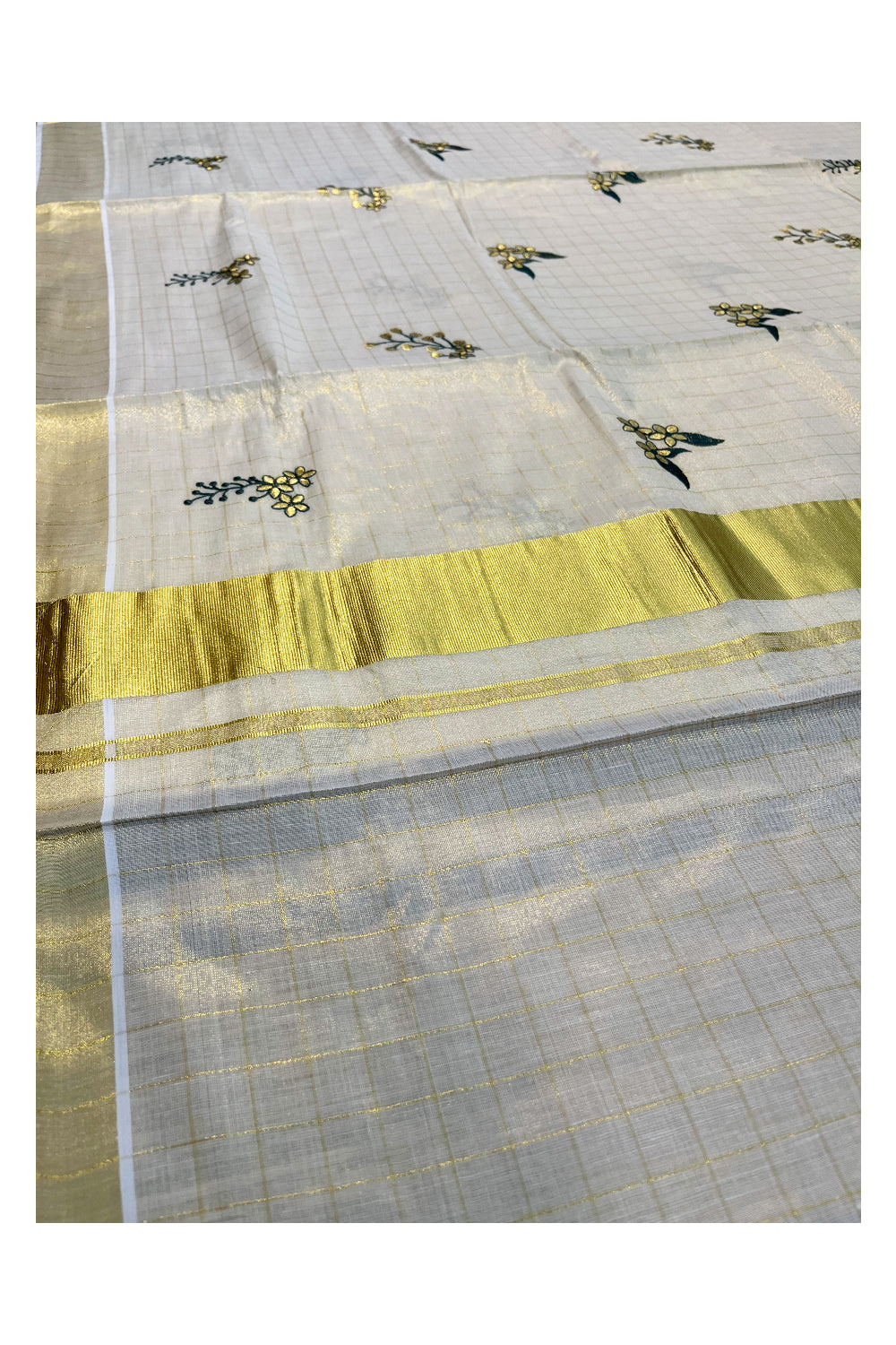 Kerala Tissue Kasavu Check Saree with Flower Embroidery Works