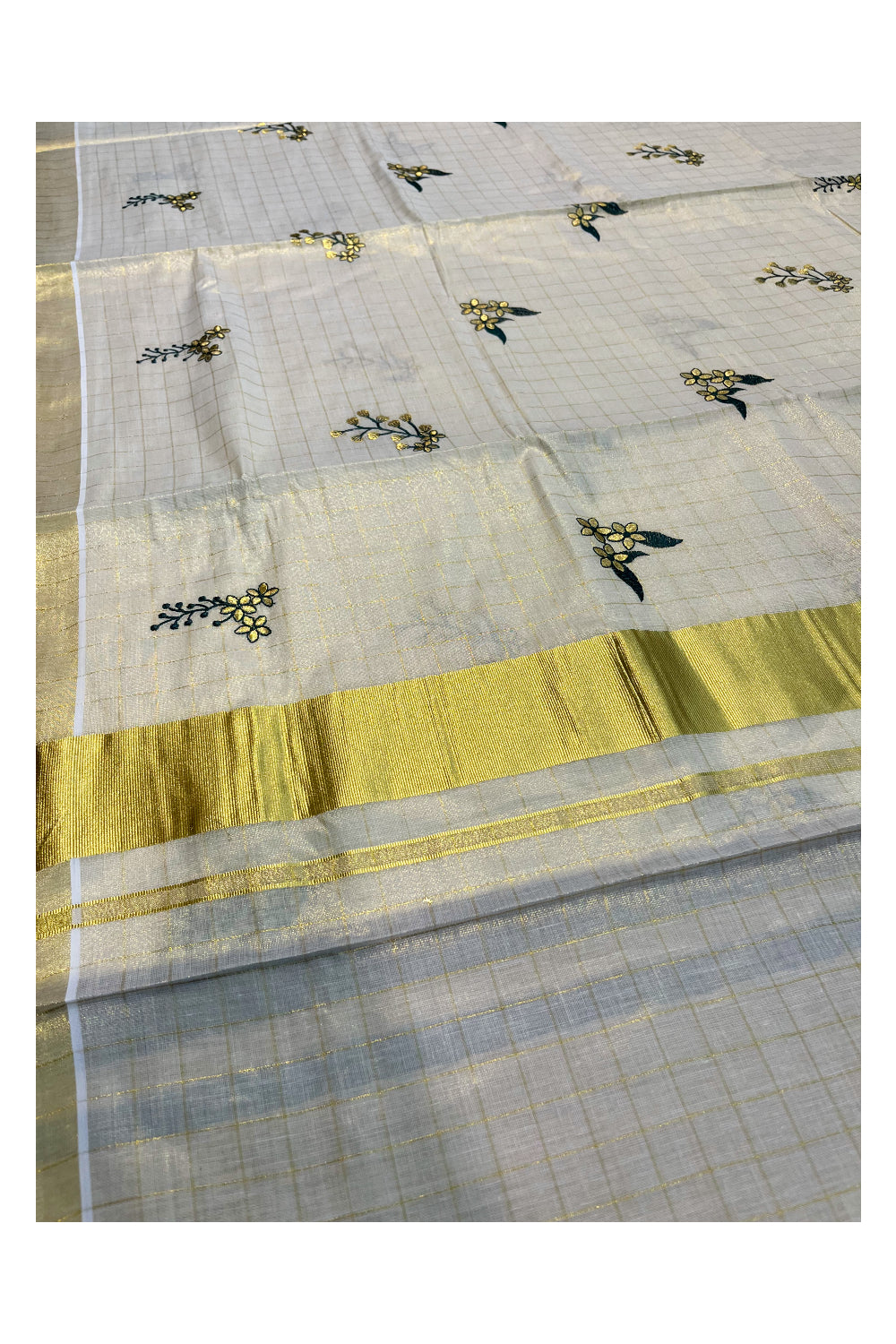 Kerala Tissue Kasavu Check Saree with Flower Embroidery Works