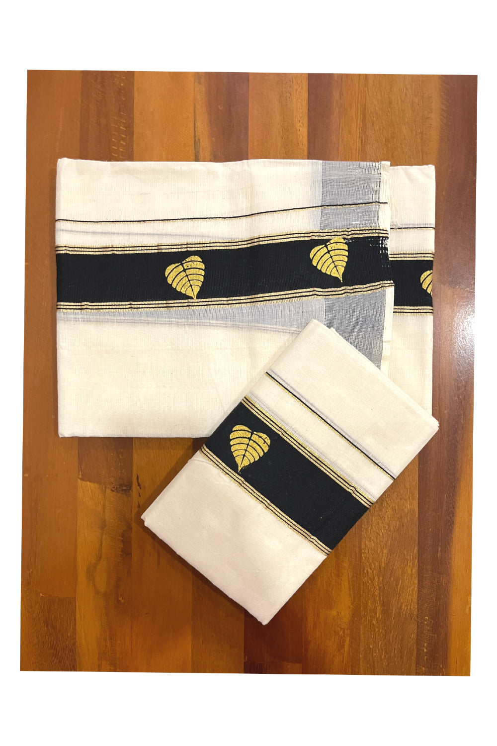 Cotton Single Set Mundu (Mundu Neriyathum) with Golden Leaf Block Prints on Black Border (Onam Set Mundu 2023)