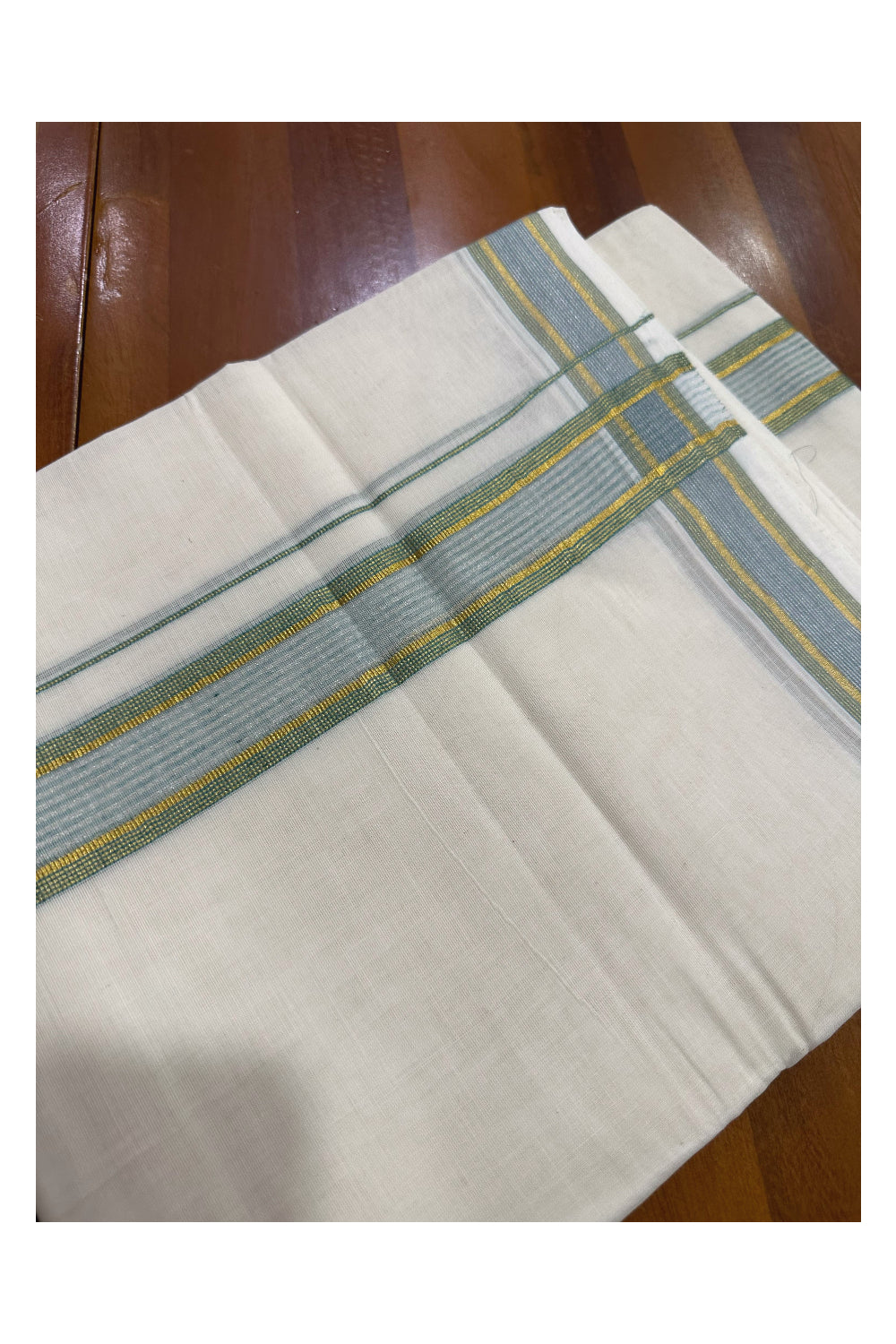 Southloom Premium Handloom Mundu with Green and Kasavu Kara (Onam Mundu 2023)