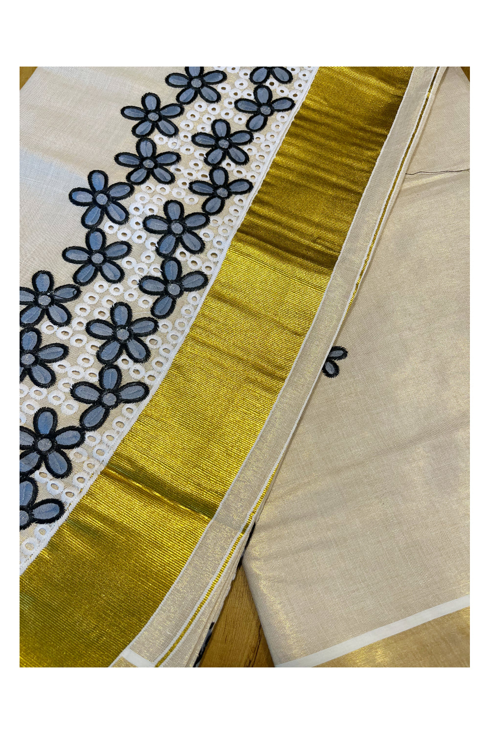 Kerala Tissue Kasavu Saree with Grey Floral Embroidery Works