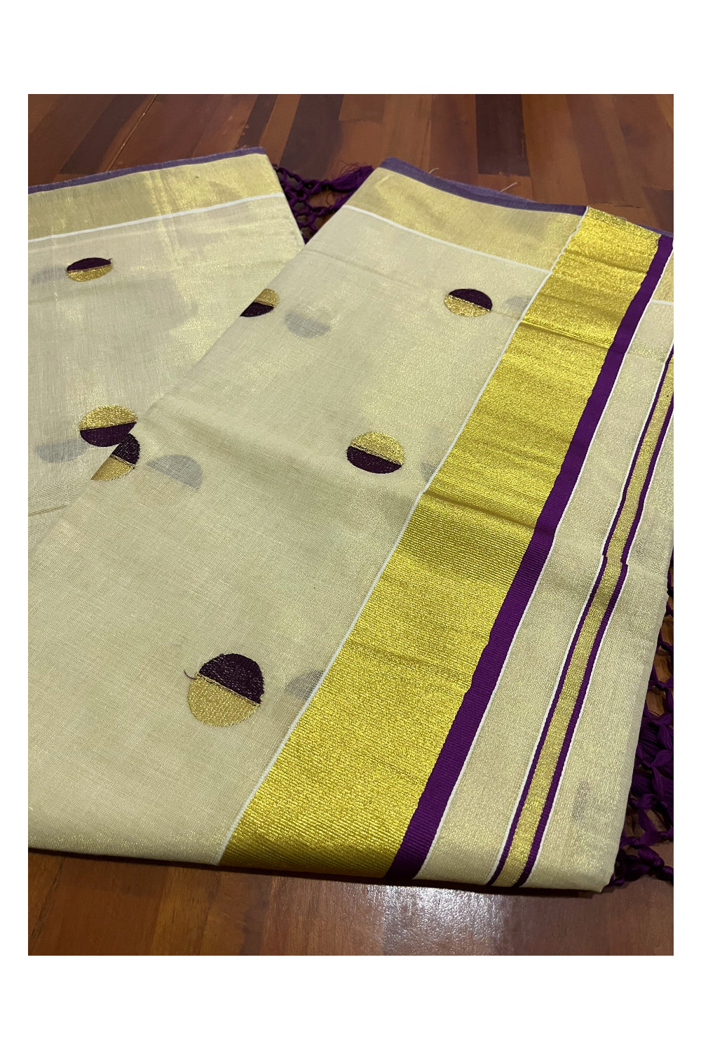 Kerala Tissue Kasavu Saree with Purple Semi Polka Woven Designs and Tassels Works