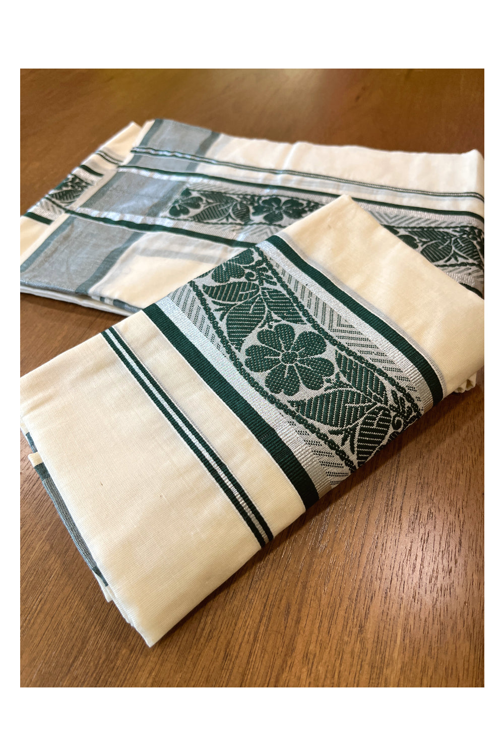 Cotton Set Mundu (Mundum Neriyathum) with Green Floral Woven Works and Silver Kasavu Border