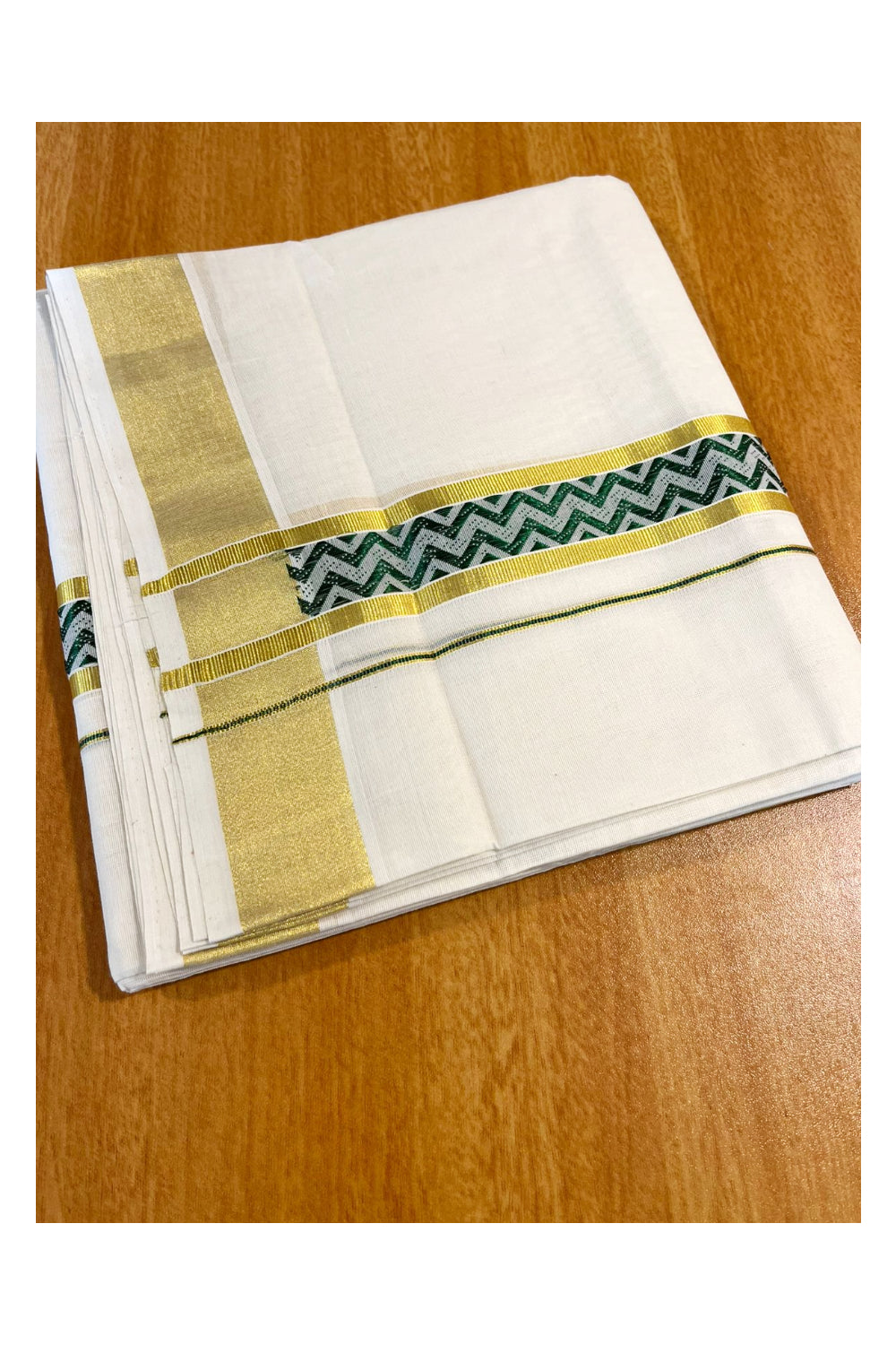 Southloom Premium Handloom Pure Cotton Mundu with Green and Kasavu Woven Border