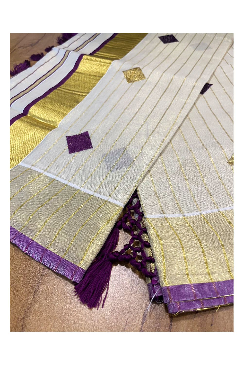 Kerala Tissue Kasavu Lines Saree with Violet and Golden Diagonal Woven Designs on Body and Pallu