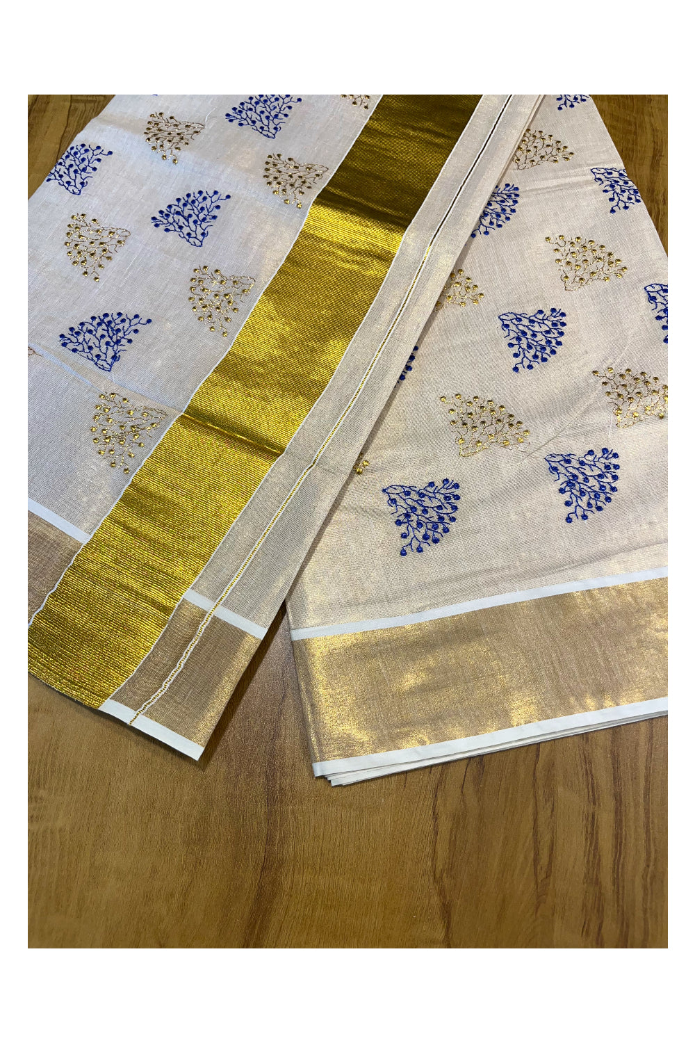 Southloom Kerala Tissue Kasavu Saree with Blue and Gold Floral Embroidery Design on Body