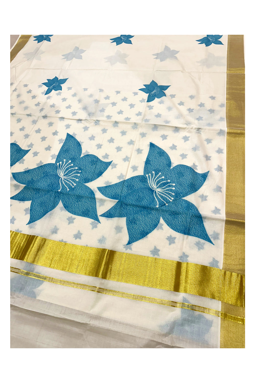 Southloom Exclusive Onam Kasavu Saree with Blue Floral Print Across Body in High Quality (Matching Printed Blouse Included)