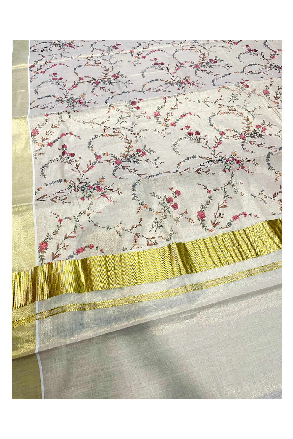 Kerala Tissue Kasavu Saree with  Floral Designs On Body