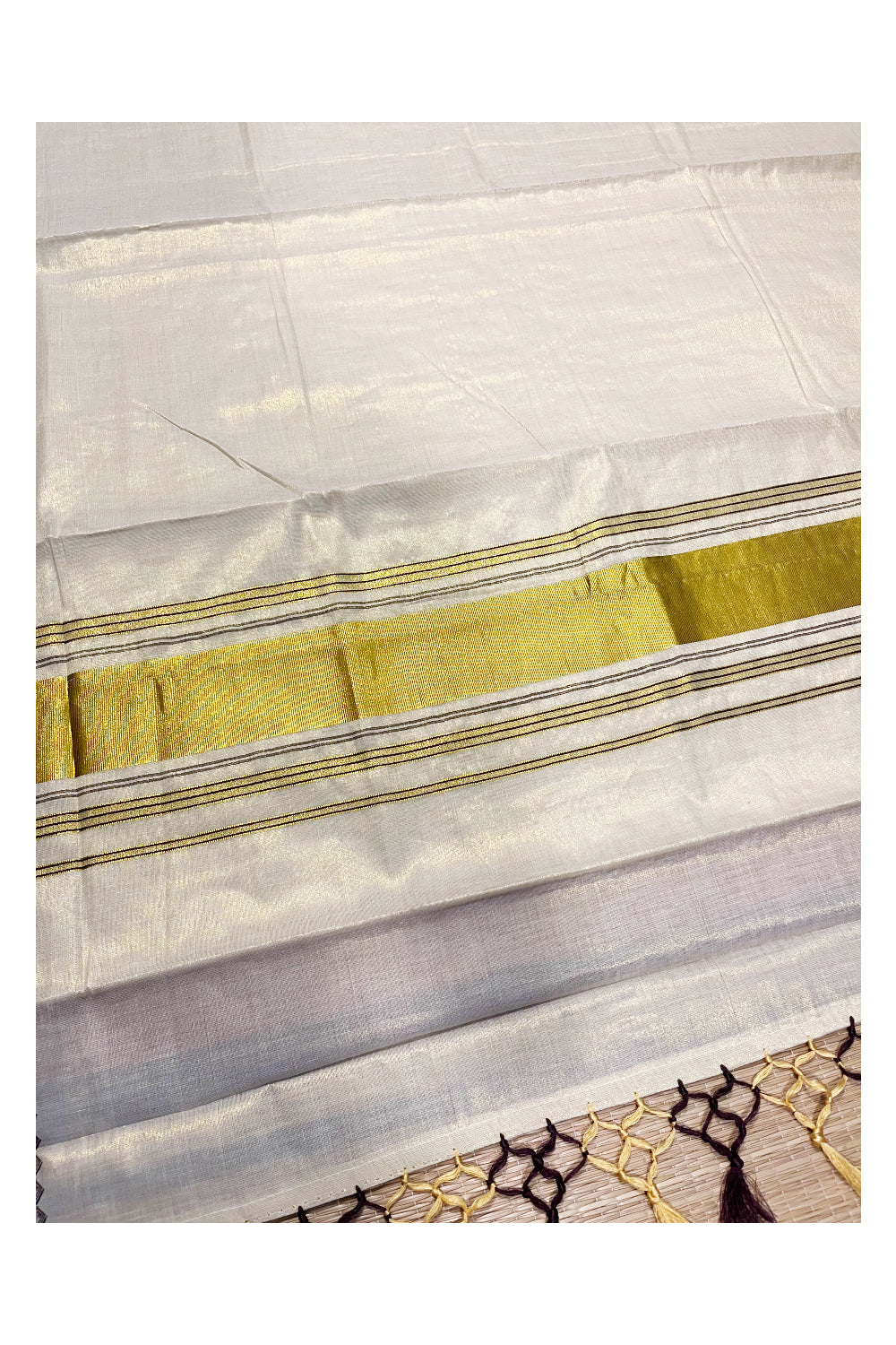 Kerala Tissue Kasavu Saree with Brown Designs On Border