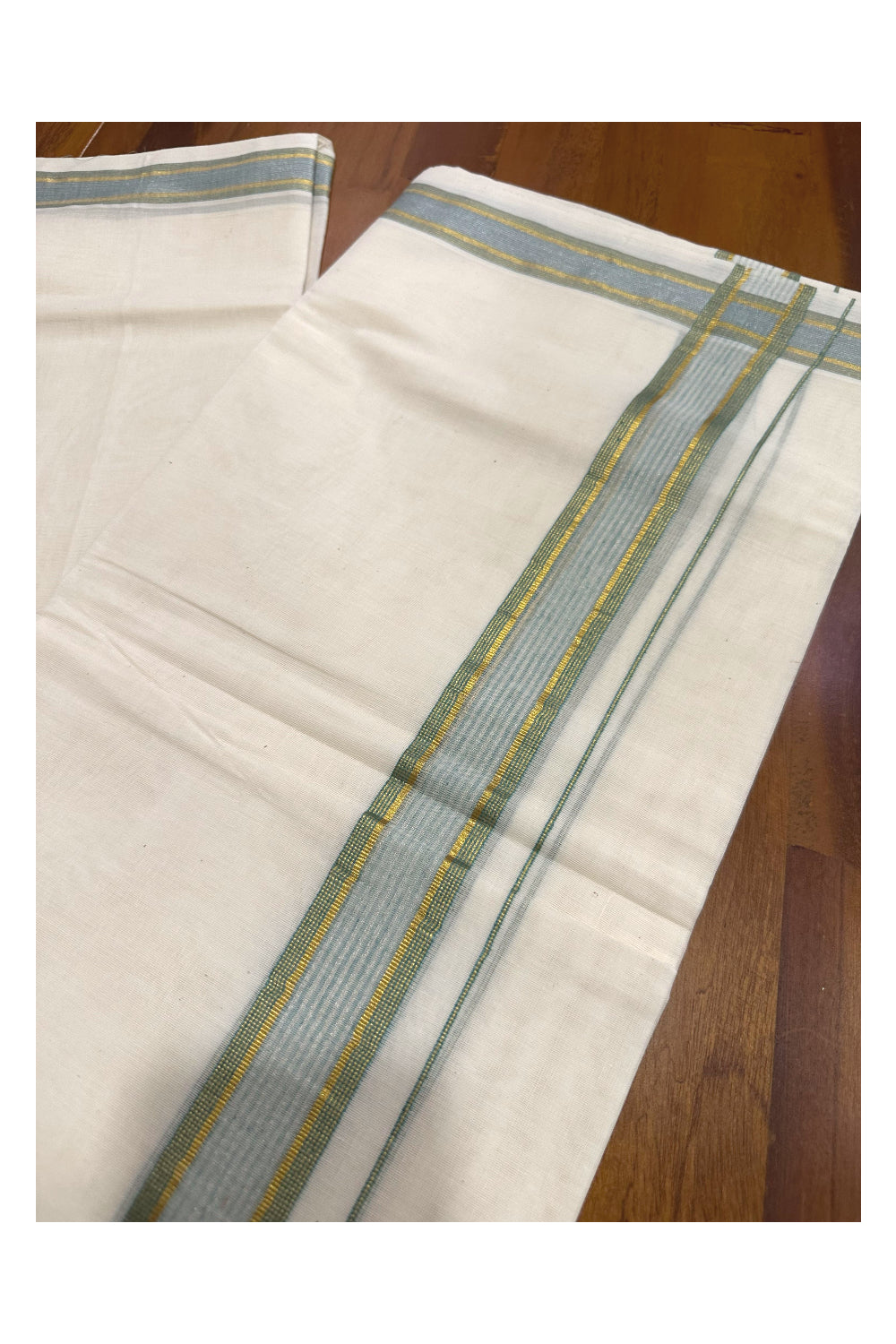 Southloom Premium Handloom Mundu with Green and Kasavu Kara (Onam Mundu 2023)