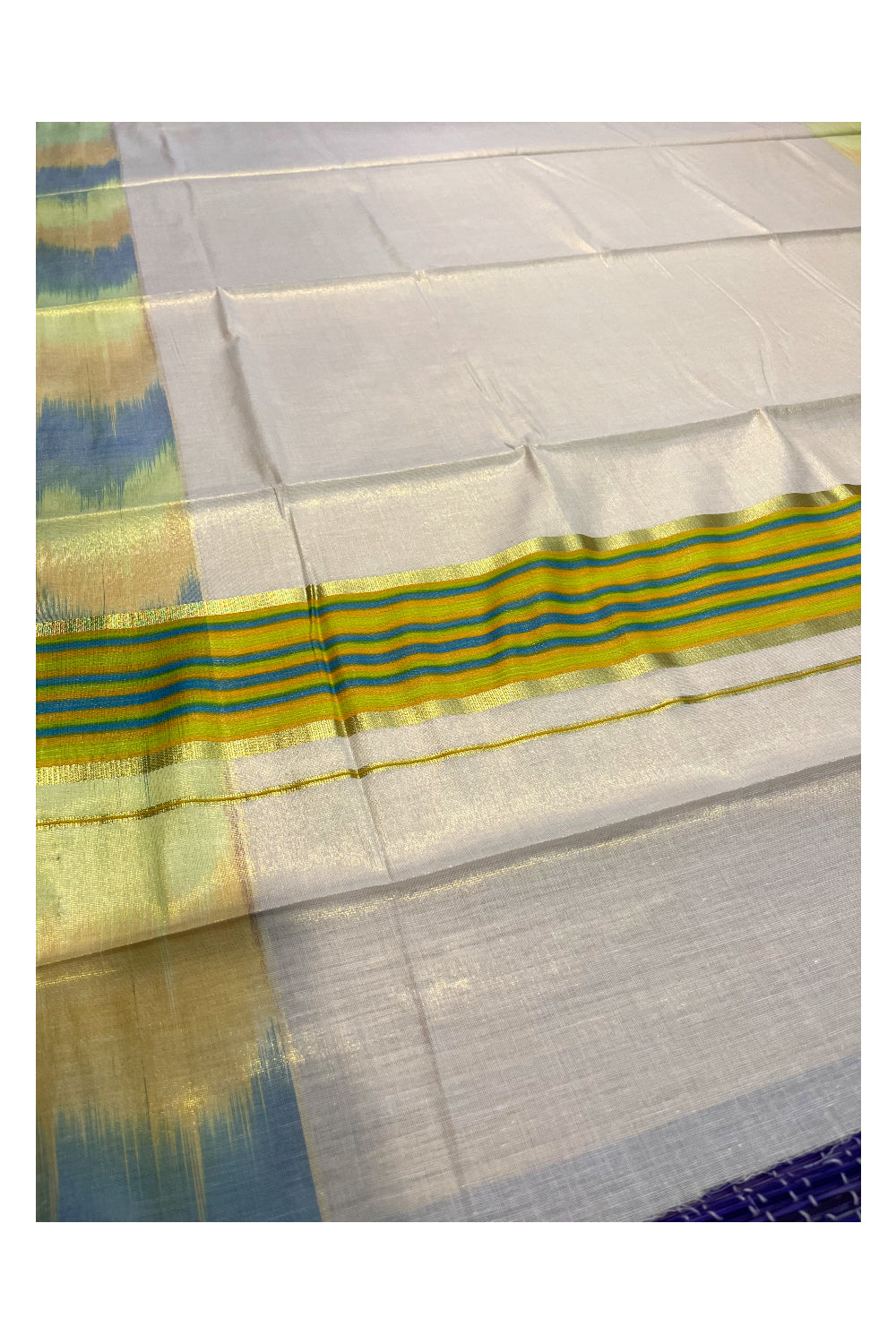 Southloom Kerala Tissue Kasavu Saree with Blue and Yellow,Orange Pochampally Design on Borders and Kara