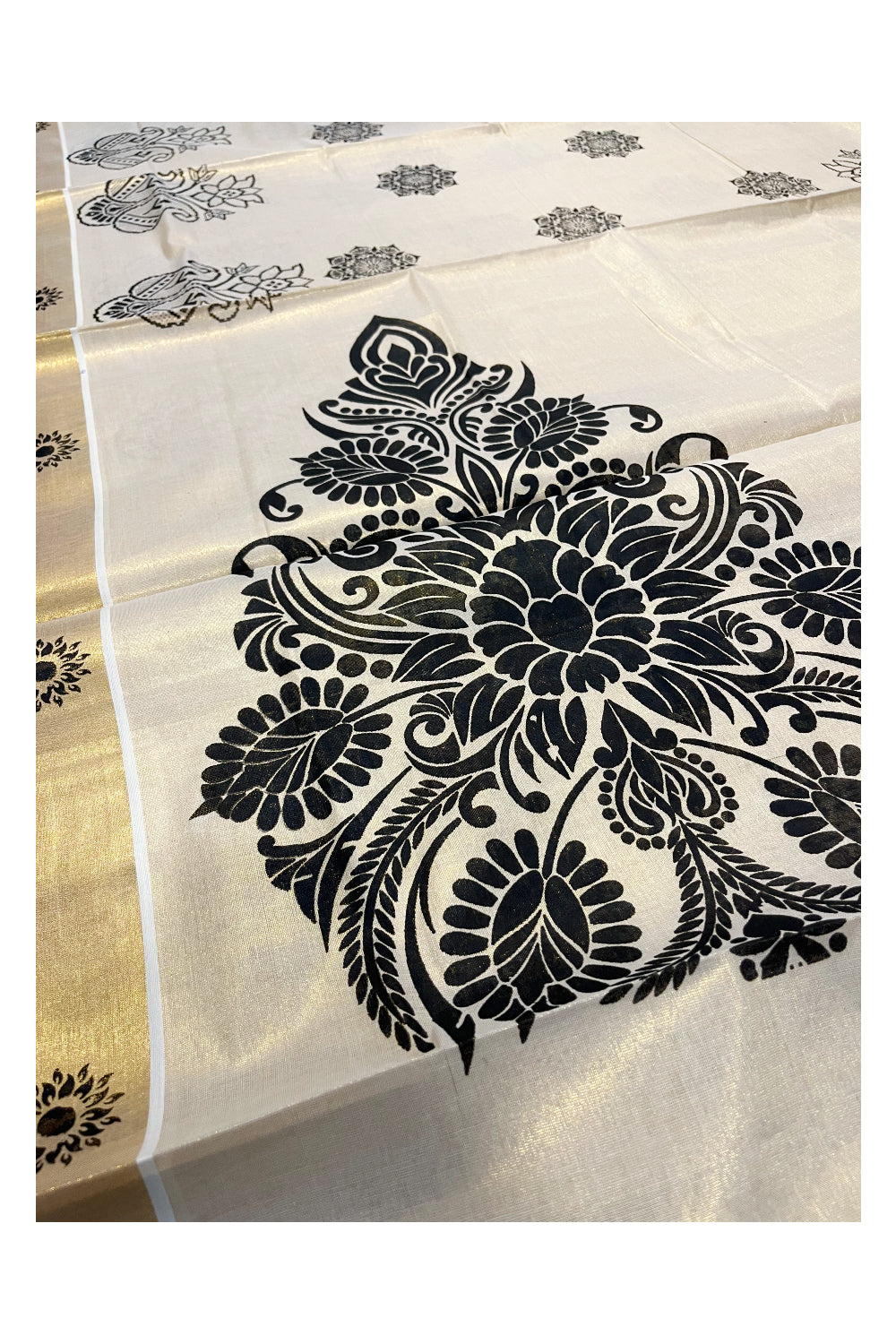 Kerala Tissue Kasavu Saree with Black Floral Block Printed Designs