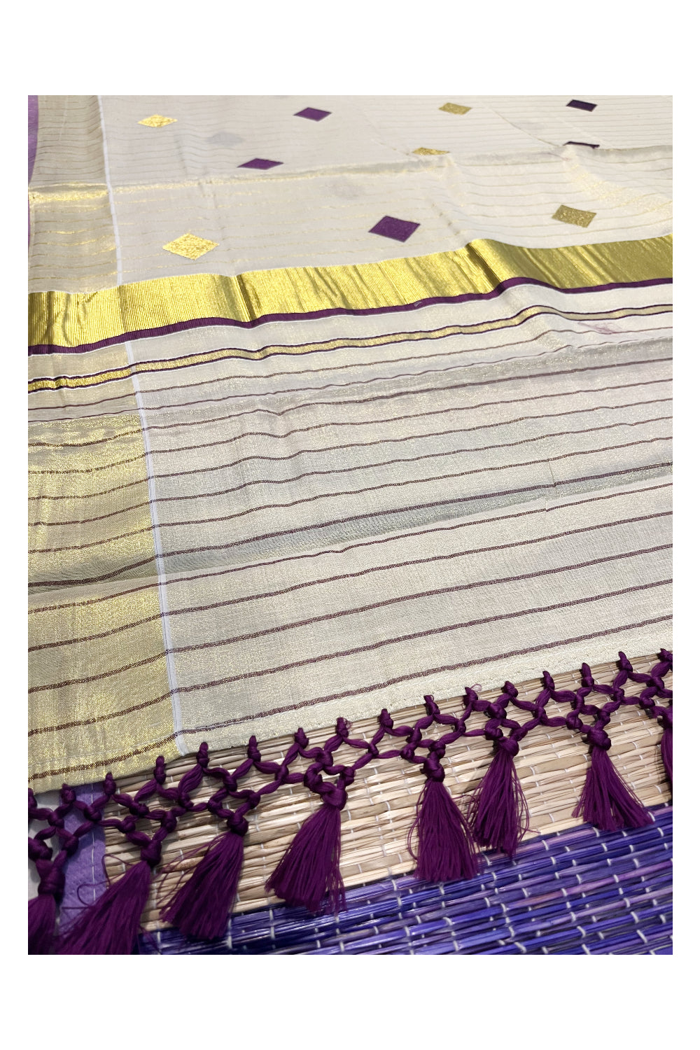 Kerala Tissue Kasavu Lines Saree with Violet and Golden Diagonal Woven Designs on Body and Pallu