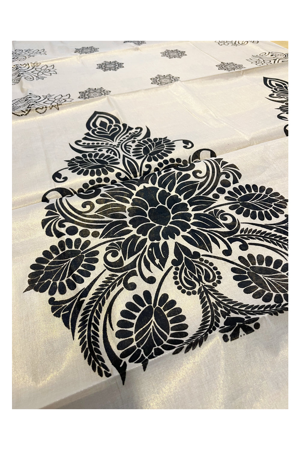 Kerala Tissue Kasavu Saree with Black Floral Block Printed Designs