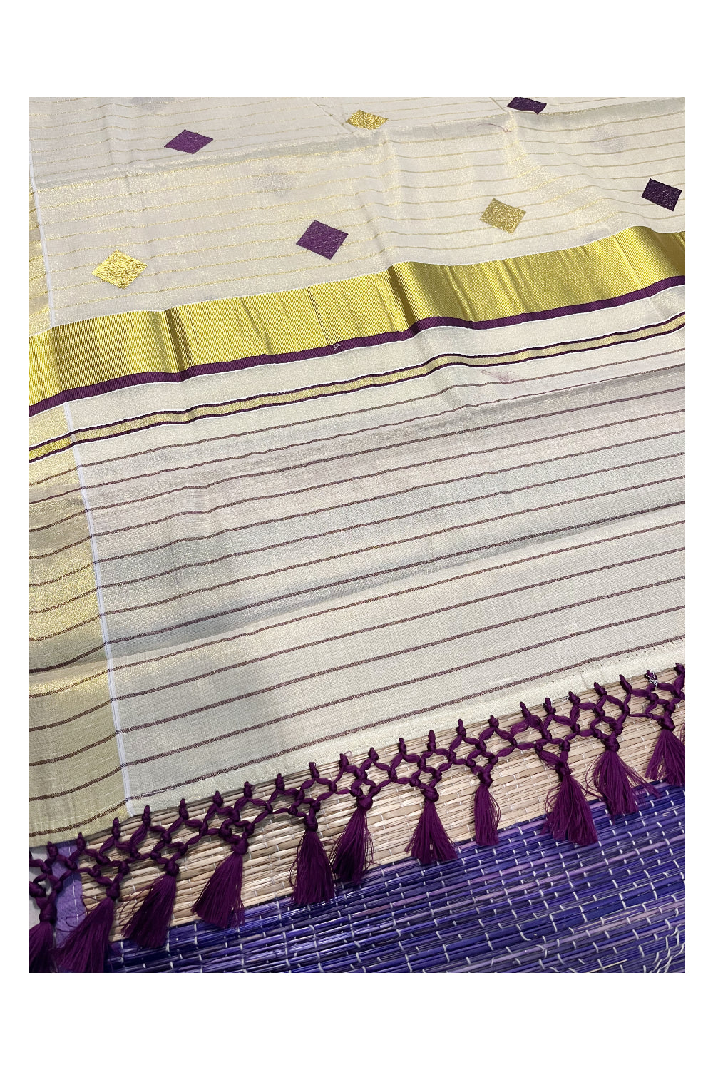 Kerala Tissue Kasavu Lines Saree with Violet and Golden Diagonal Woven Designs on Body and Pallu