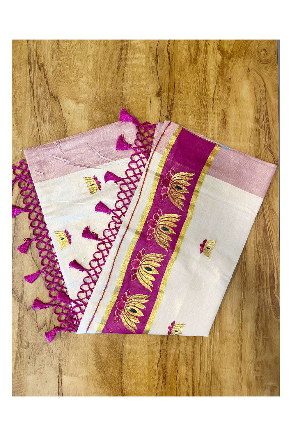 Southloom Kerala Tissue Kasavu Saree with Magenta And Golden Lotus Embroidary Works on Body