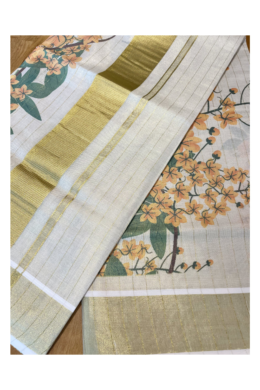 Kerala Tissue Kasavu Lines Design Saree with Kanikonna Floral Prints on Body