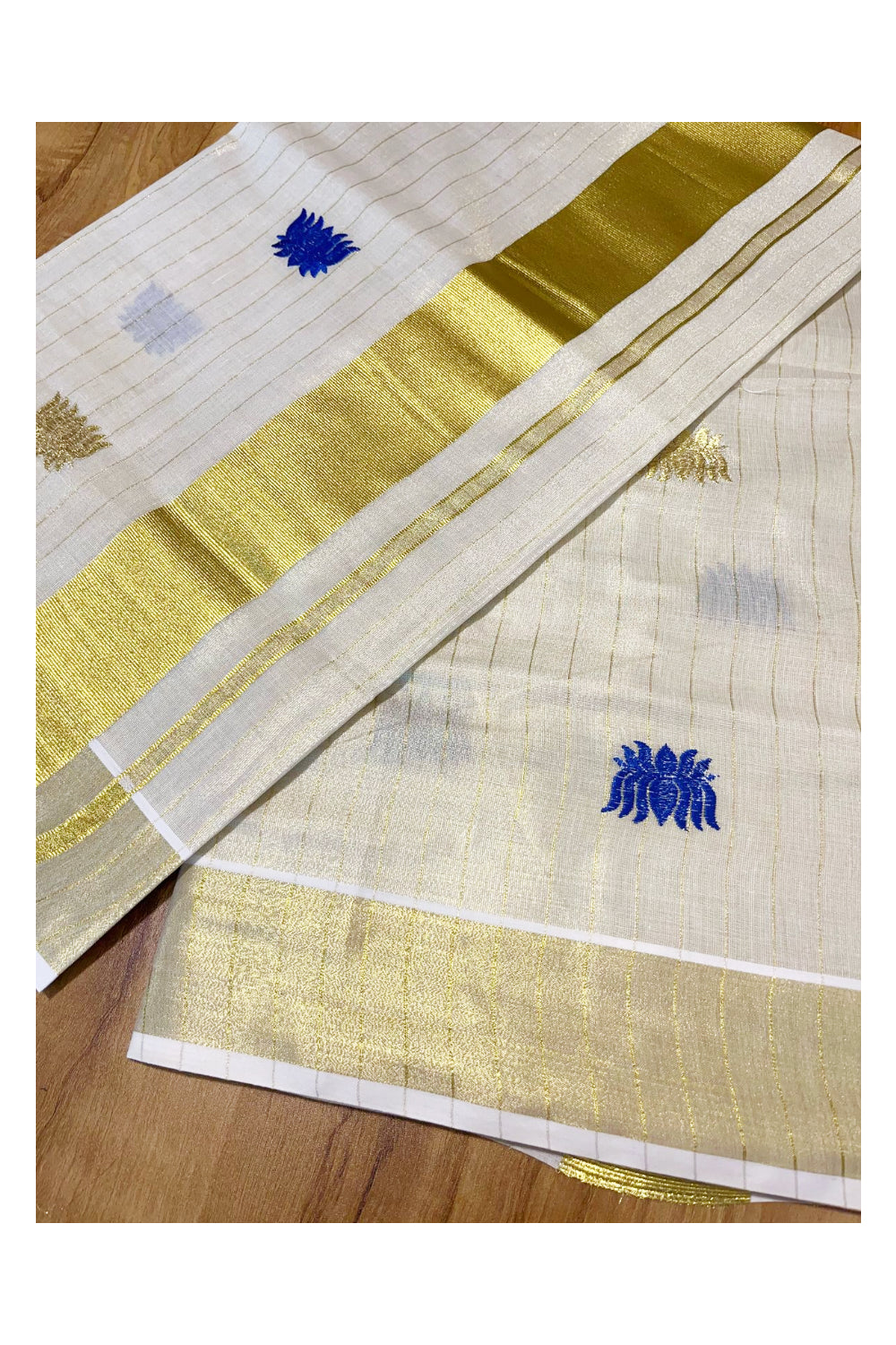 Southloom Kerala Tissue Kasavu Lines Saree with Blue Lotus Embroidery Works