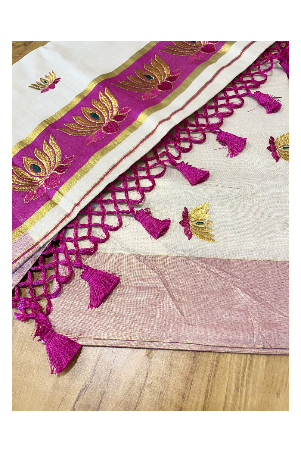 Southloom Kerala Tissue Kasavu Saree with Magenta And Golden Lotus Embroidary Works on Body