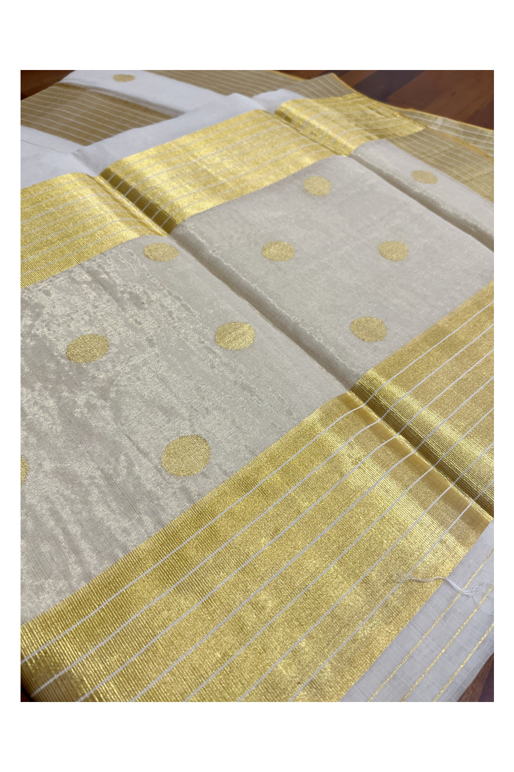 Southloom Premium Handloom Balaramapuram Unakkupaavu Tissue Kasavu Saree With Golden Polka Woven Designs on Body