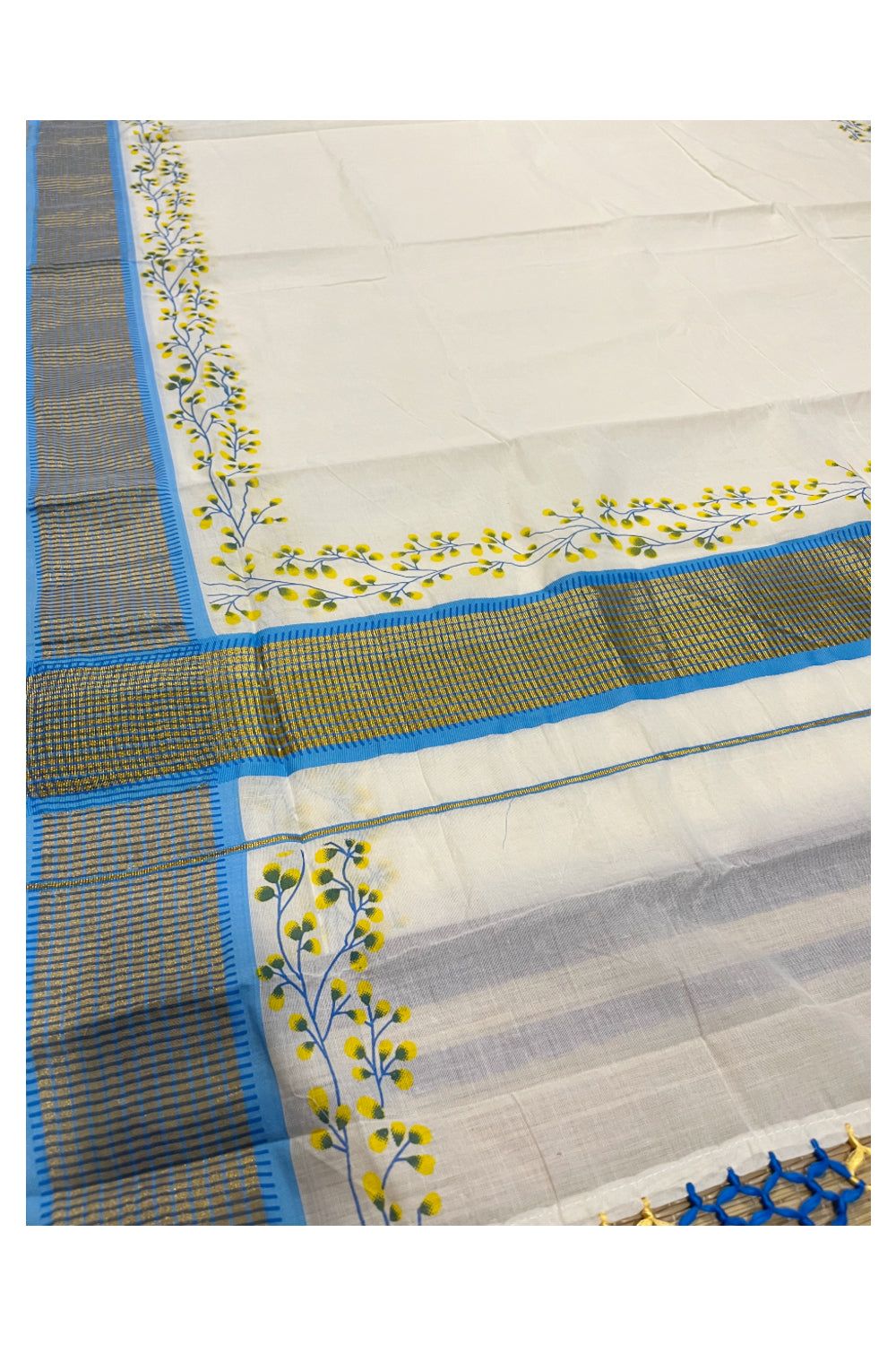 Southloom Blue Floral Print Saree with Kasavu Check Borders