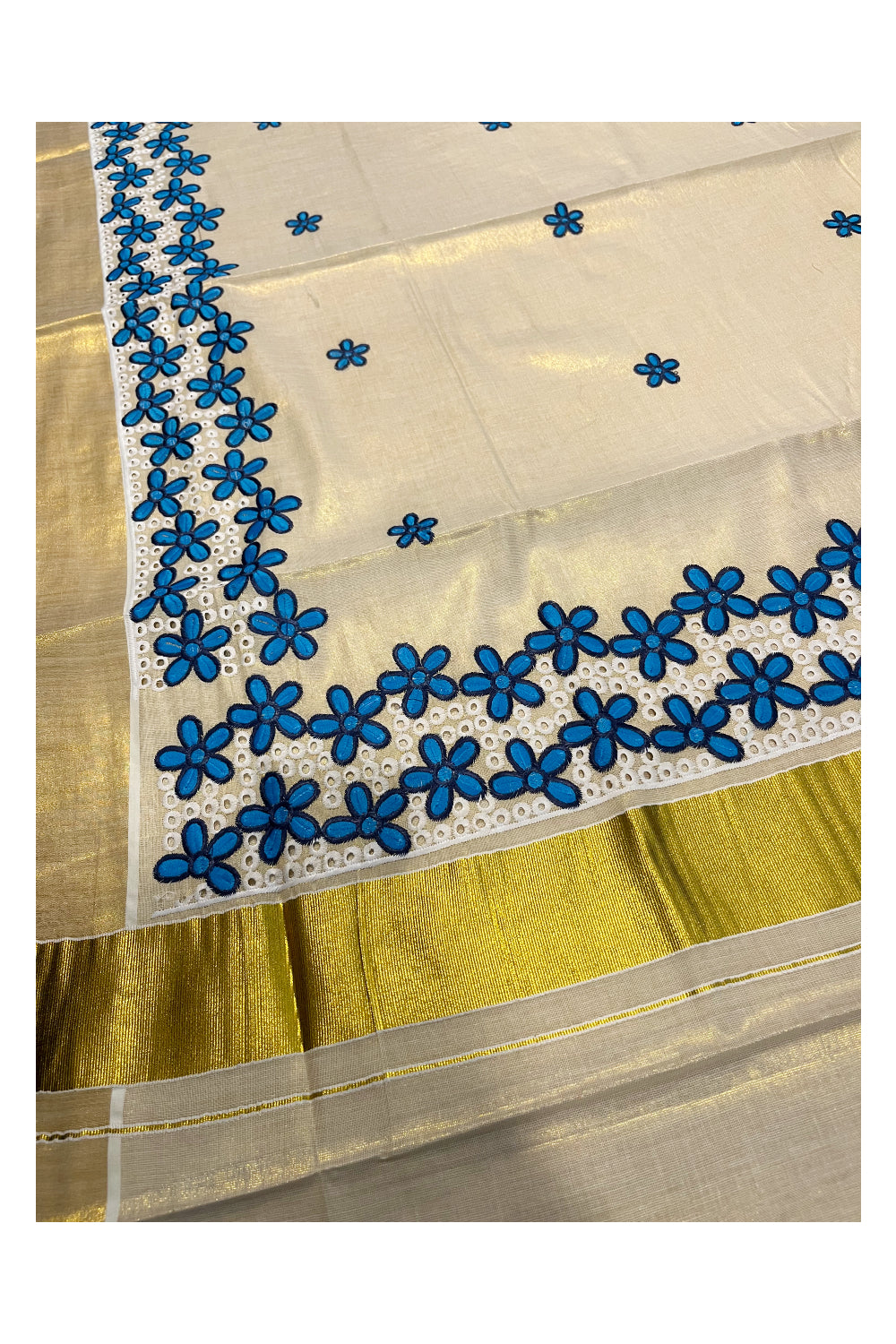 Kerala Tissue Kasavu Saree with Blue Floral Embroidery Works