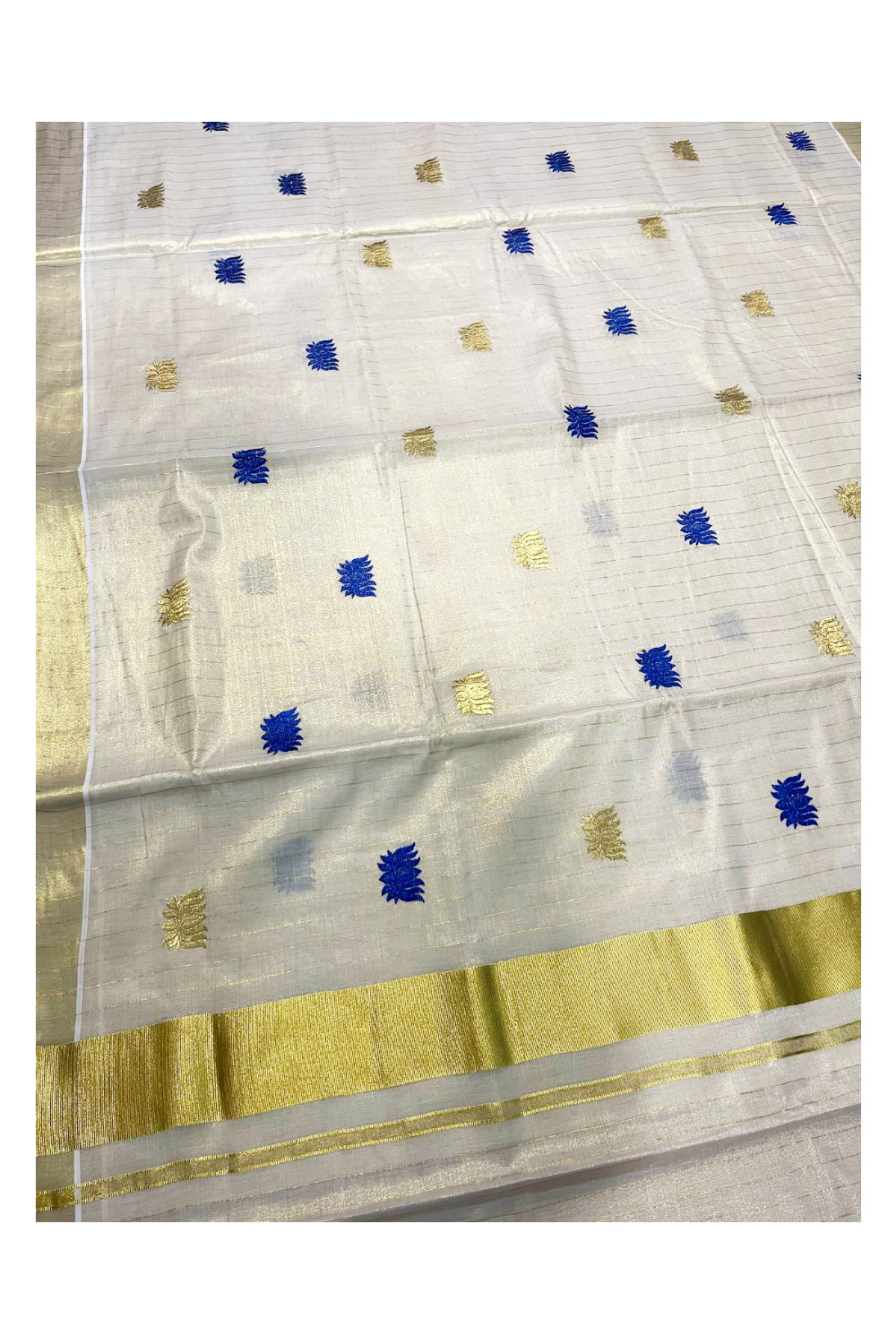 Southloom Kerala Tissue Kasavu Lines Saree with Blue Lotus Embroidery Works