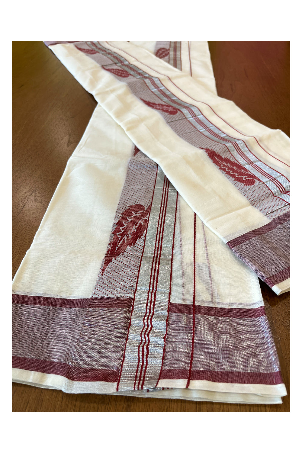 Cotton Set Mundu (Mundum Neriyathum) with Maroon Leaf Woven Works and Silver Kasavu Border