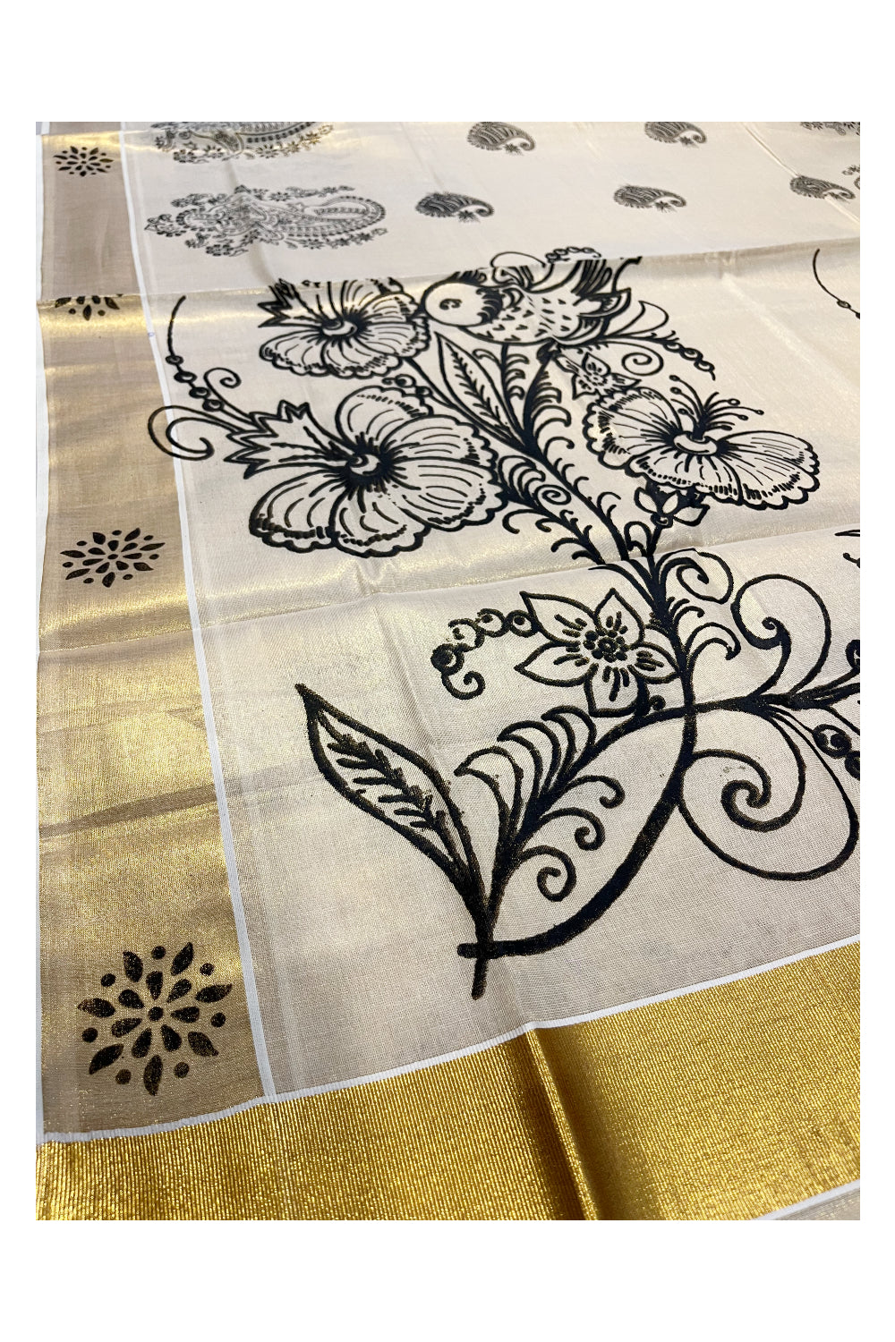 Kerala Tissue Kasavu Saree with Black Floral Block Printed Designs