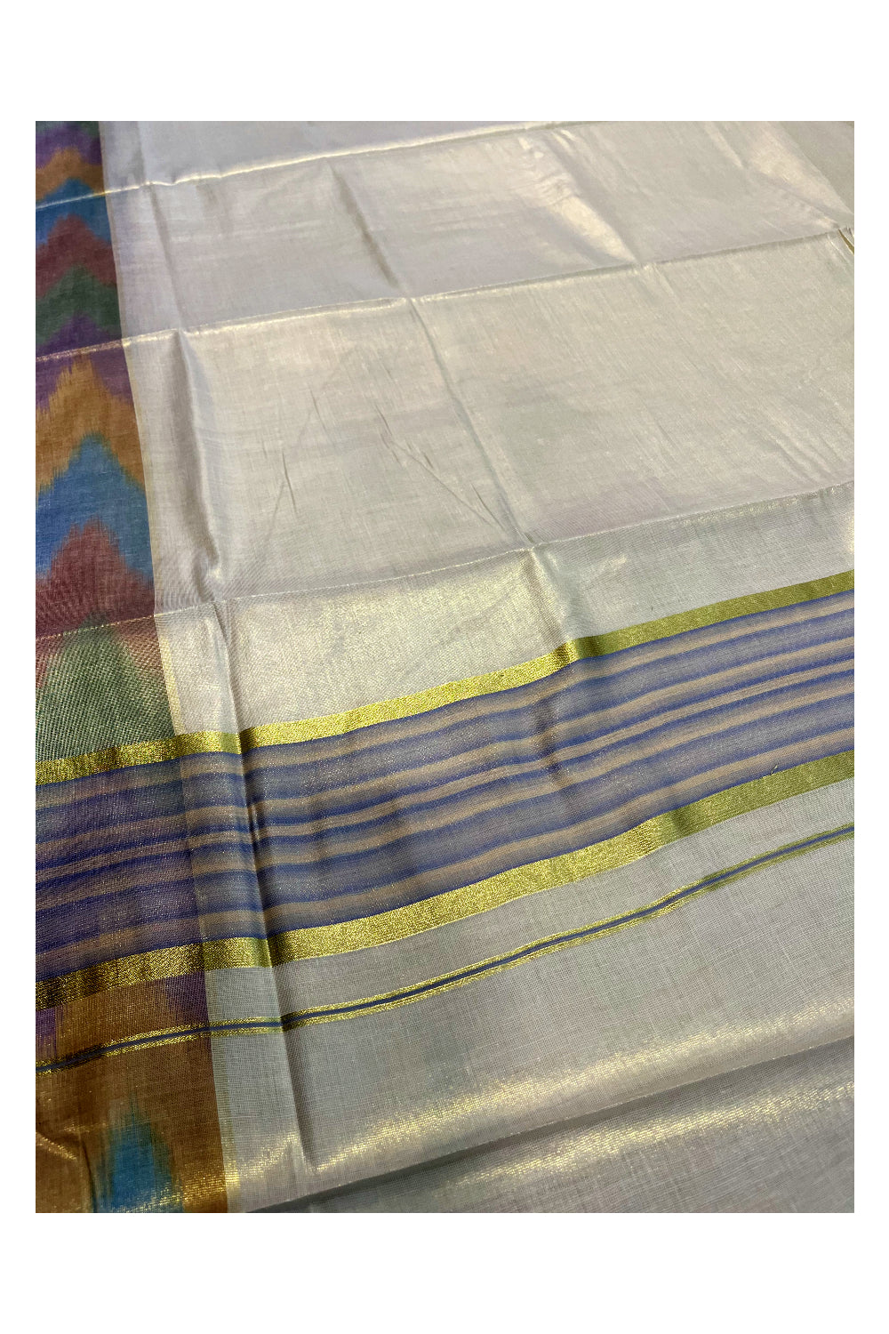 Southloom Kerala Tissue Kasavu Saree with Blue and Cream Pochampally Design on Borders and Kara