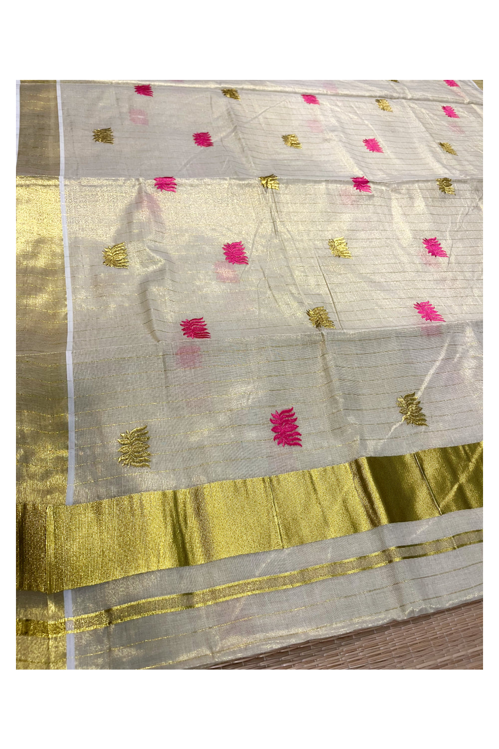 Kerala Tissue Kasavu Lines Saree with Pink And Golden Lotus Embroidery Works