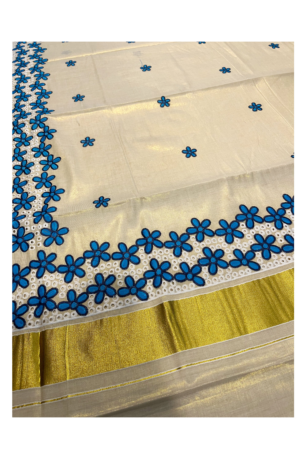 Kerala Tissue Kasavu Saree with Blue Floral Embroidery Works