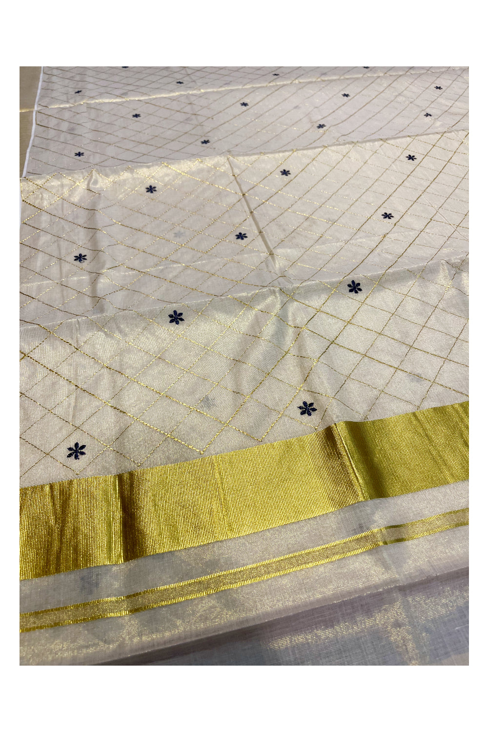 Kerala Tissue Kasavu Check Saree with Blue Flower Embroidery Works