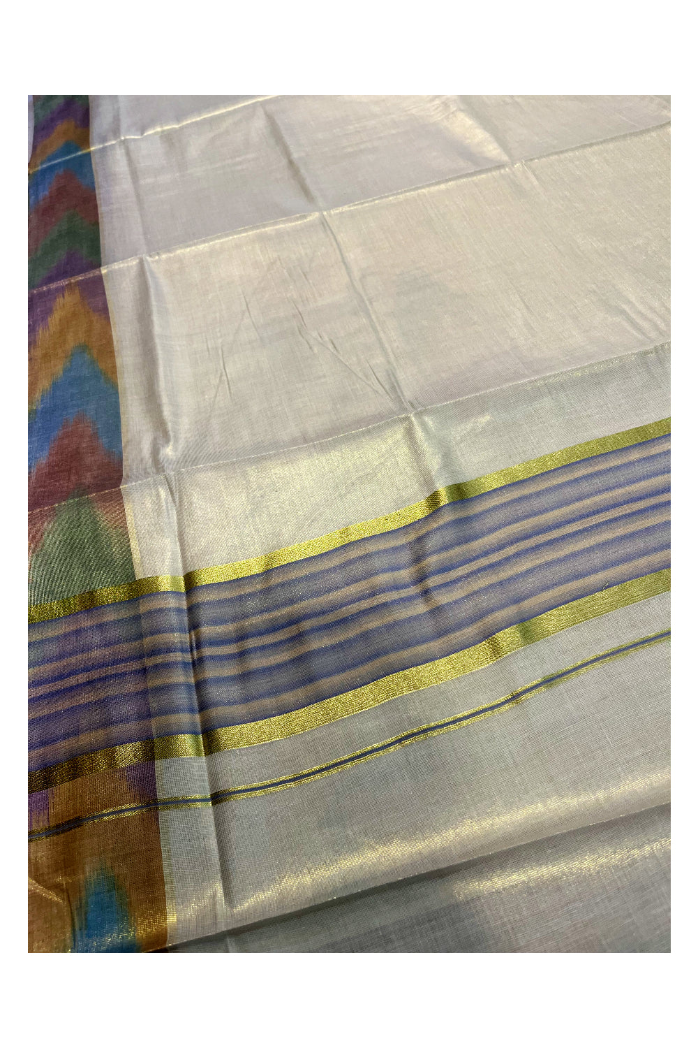 Southloom Kerala Tissue Kasavu Saree with Blue and Cream Pochampally Design on Borders and Kara