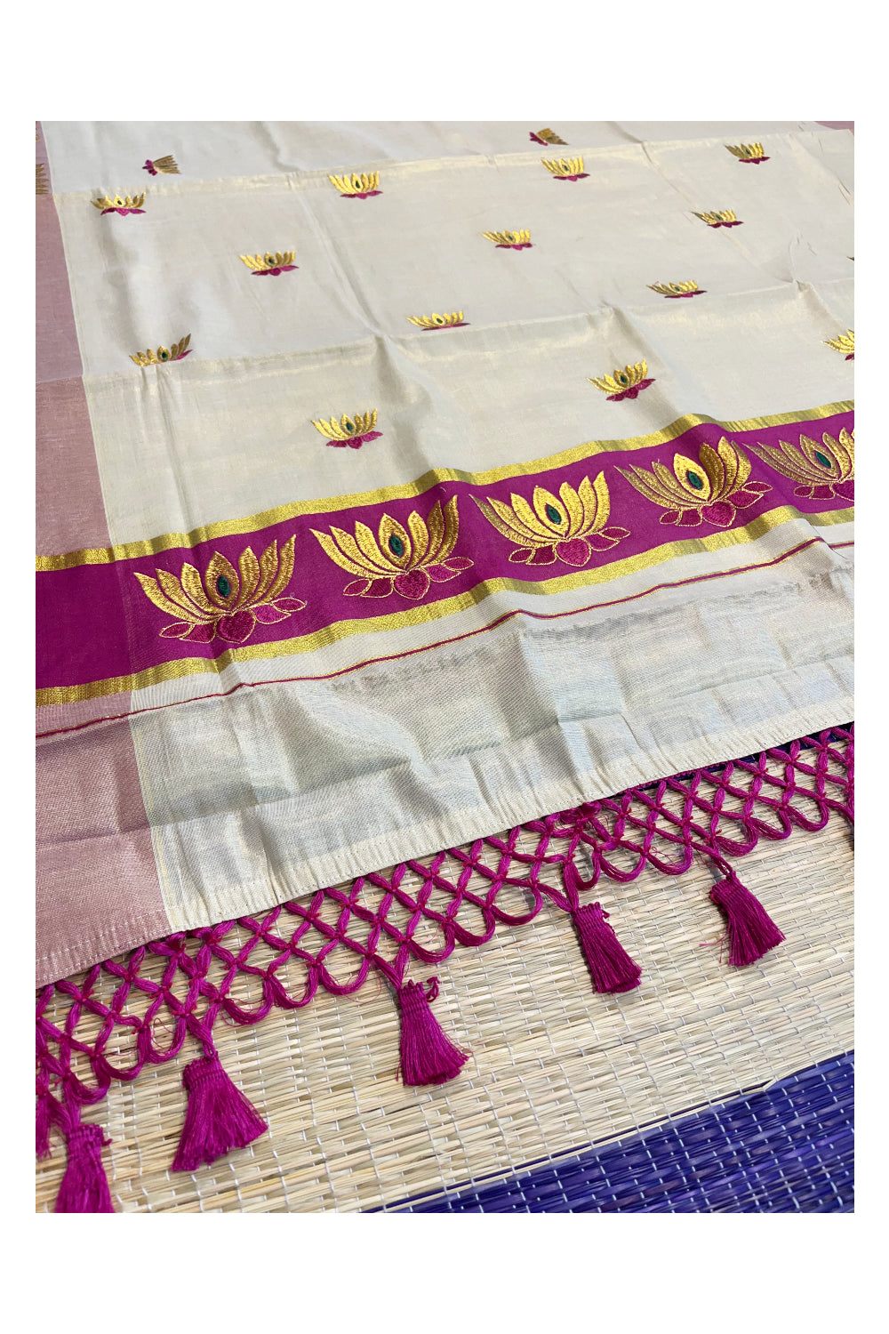 Southloom Kerala Tissue Kasavu Saree with Magenta And Golden Lotus Embroidary Works on Body
