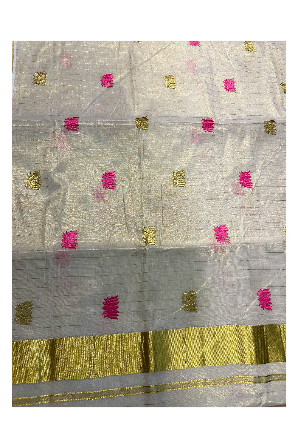 Kerala Tissue Kasavu Lines Saree with Pink And Golden Lotus Embroidery Works