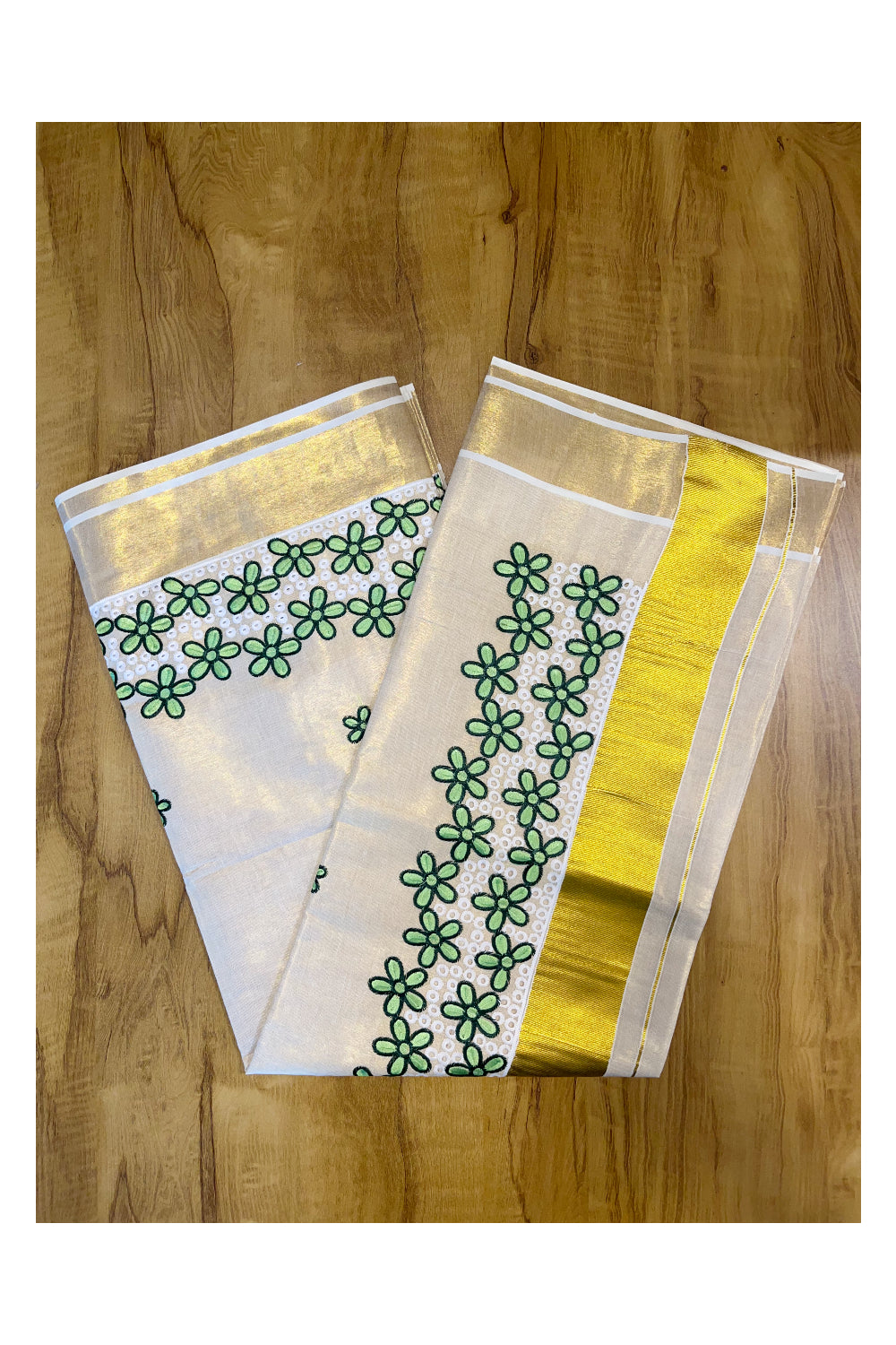 Kerala Tissue Kasavu Saree with Green Floral Embroidery Works