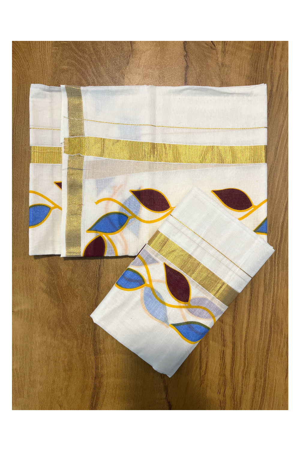 Pure Cotton Set Mundu (Mundum Neriyathum) with Brown and Blue Leaf Prints on Kasavu Border(2.80M)