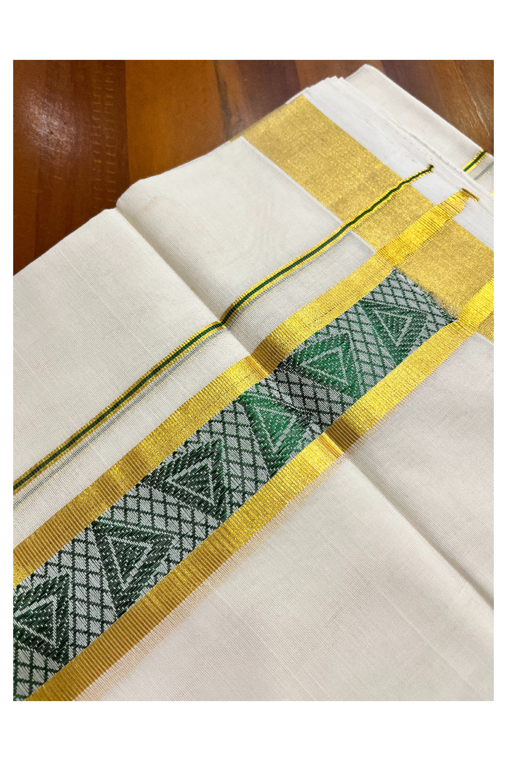 Southloom Premium Handloom Pure Cotton Mundu with Golden and Green Kasavu Woven Border (Vishu 2024 Collection)