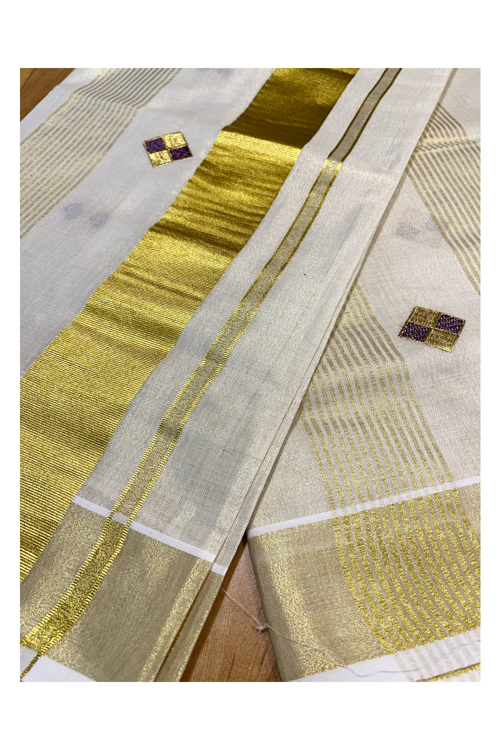 Kerala Tissue Kasavu Stripes Saree with Violet and Golden Diagonal Floral Embroidery Design on Body