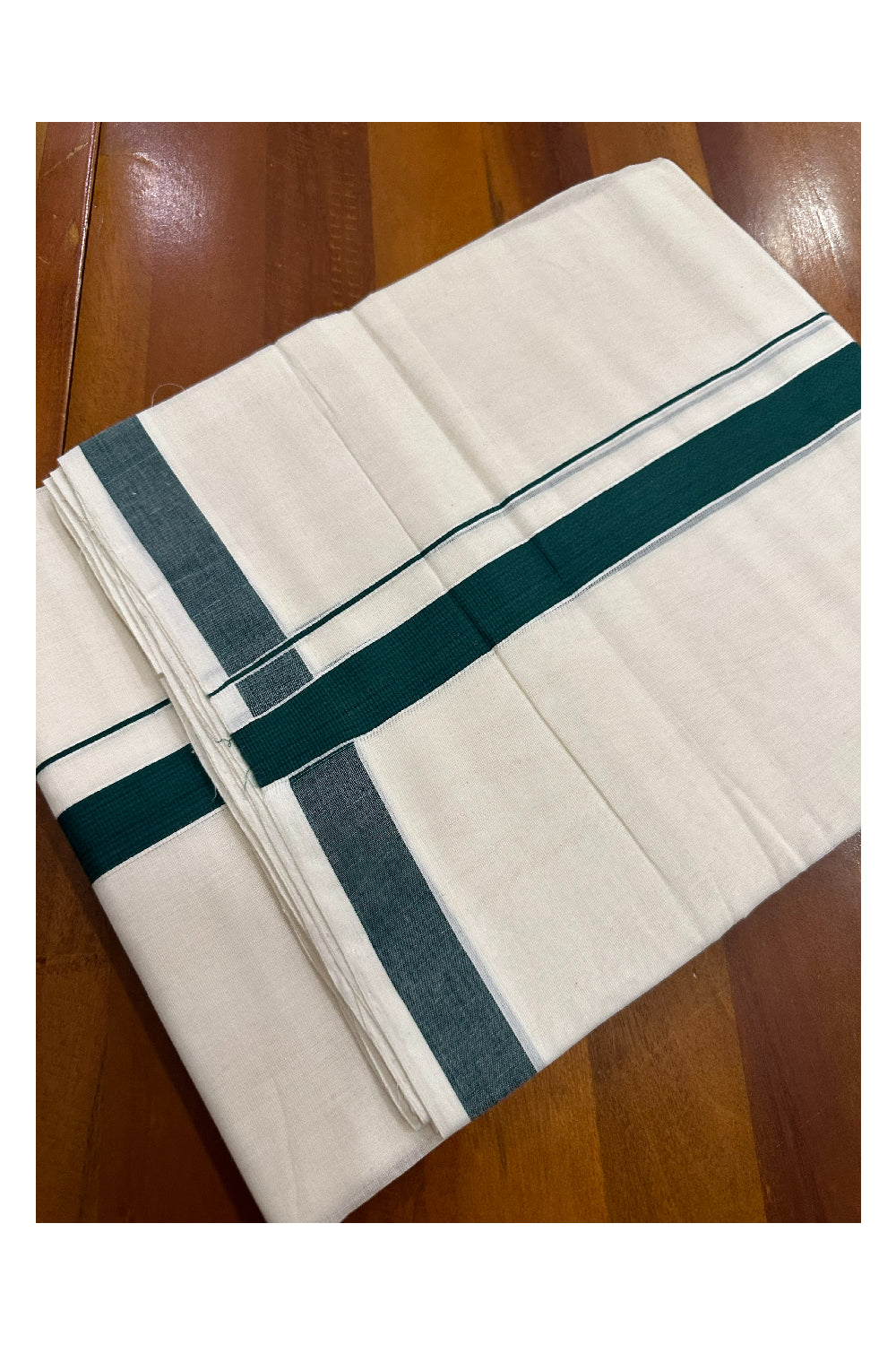 Southloom Premium Handloom Mundu with Green Kara (Onam Mundu 2023)