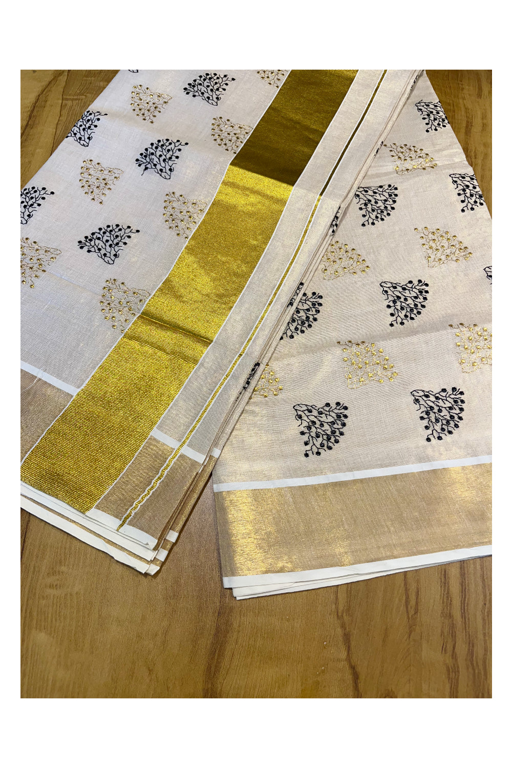 Southloom Kerala Tissue Kasavu Saree with Black and Gold Floral Embroidery Design on Body