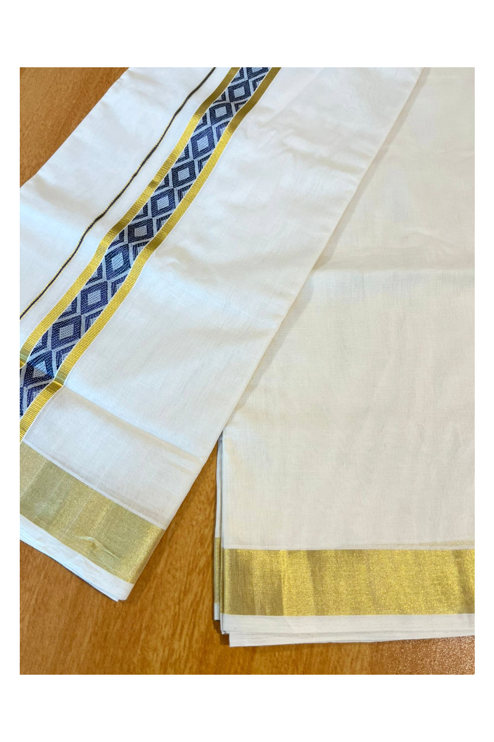 Southloom Premium Handloom Pure Cotton Mundu with Blue and Kasavu Woven Border